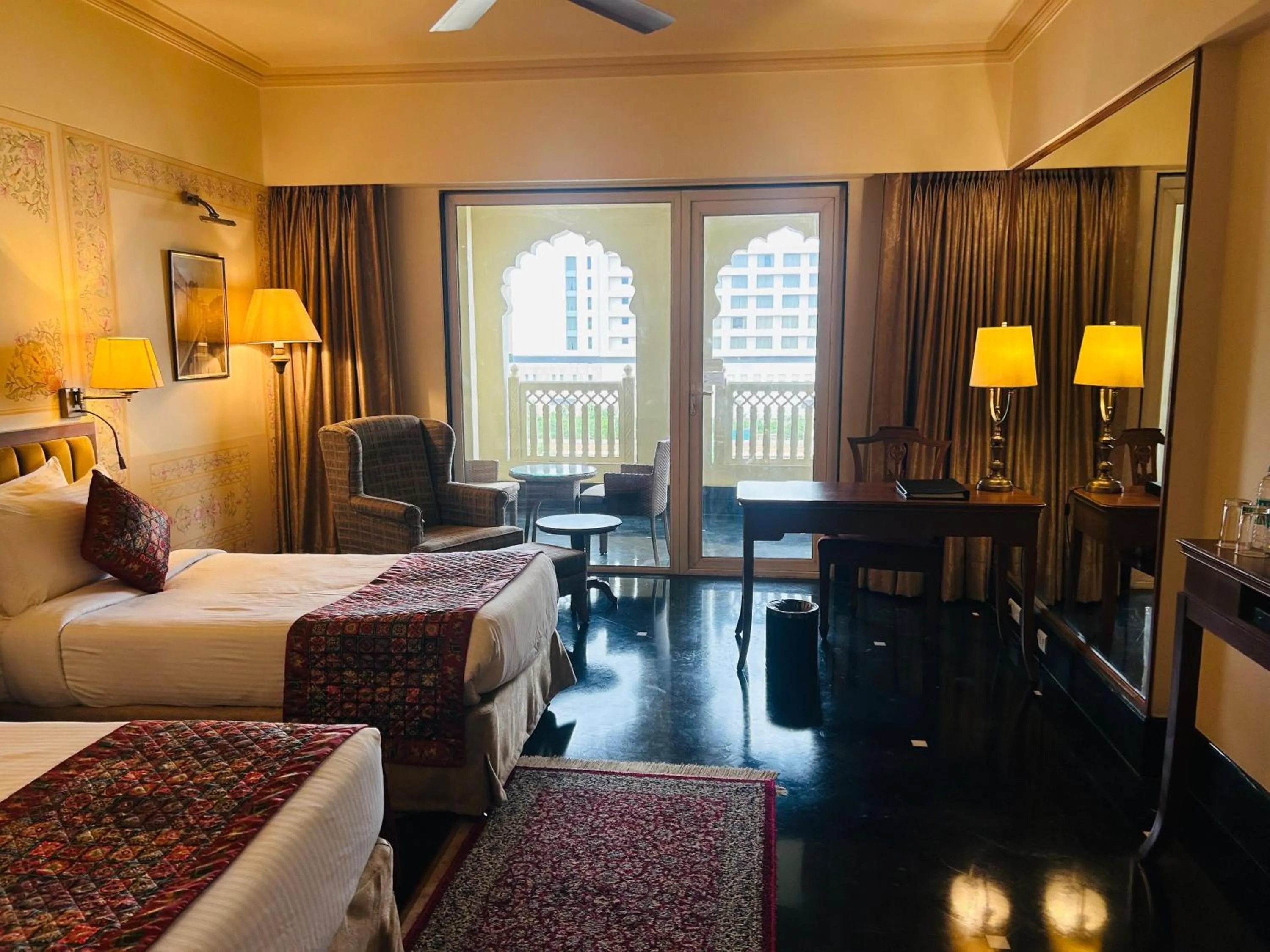 Photo of the whole room, Bed in Indana Palace Jaipur