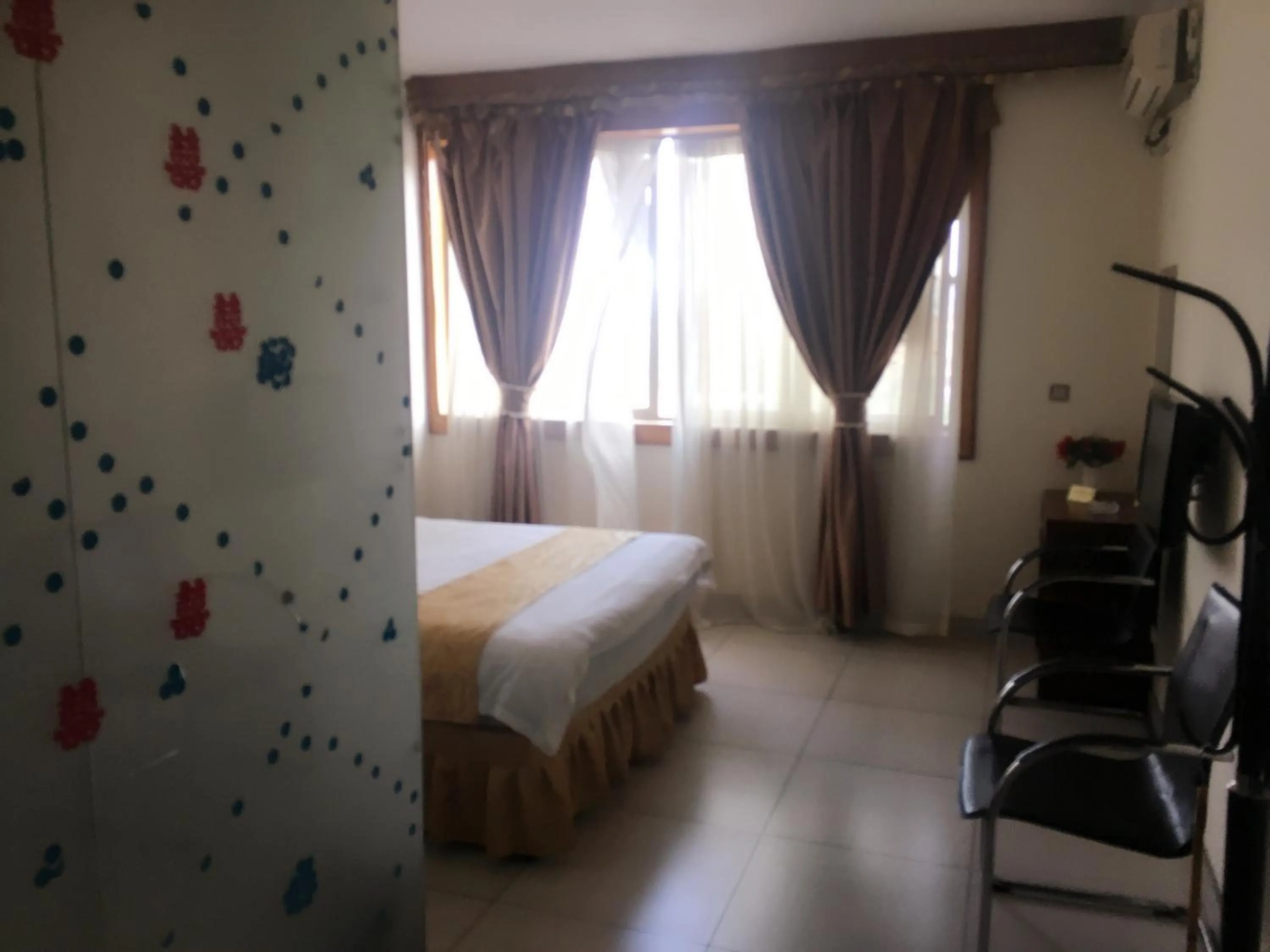 Bedroom in Shengtang Business Hotel