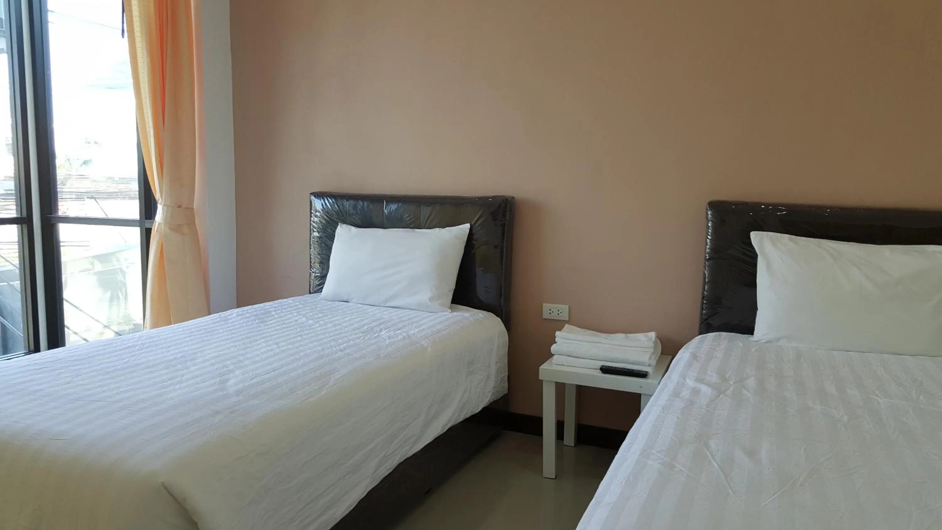 Bed in Charoensuk Grand Hotel