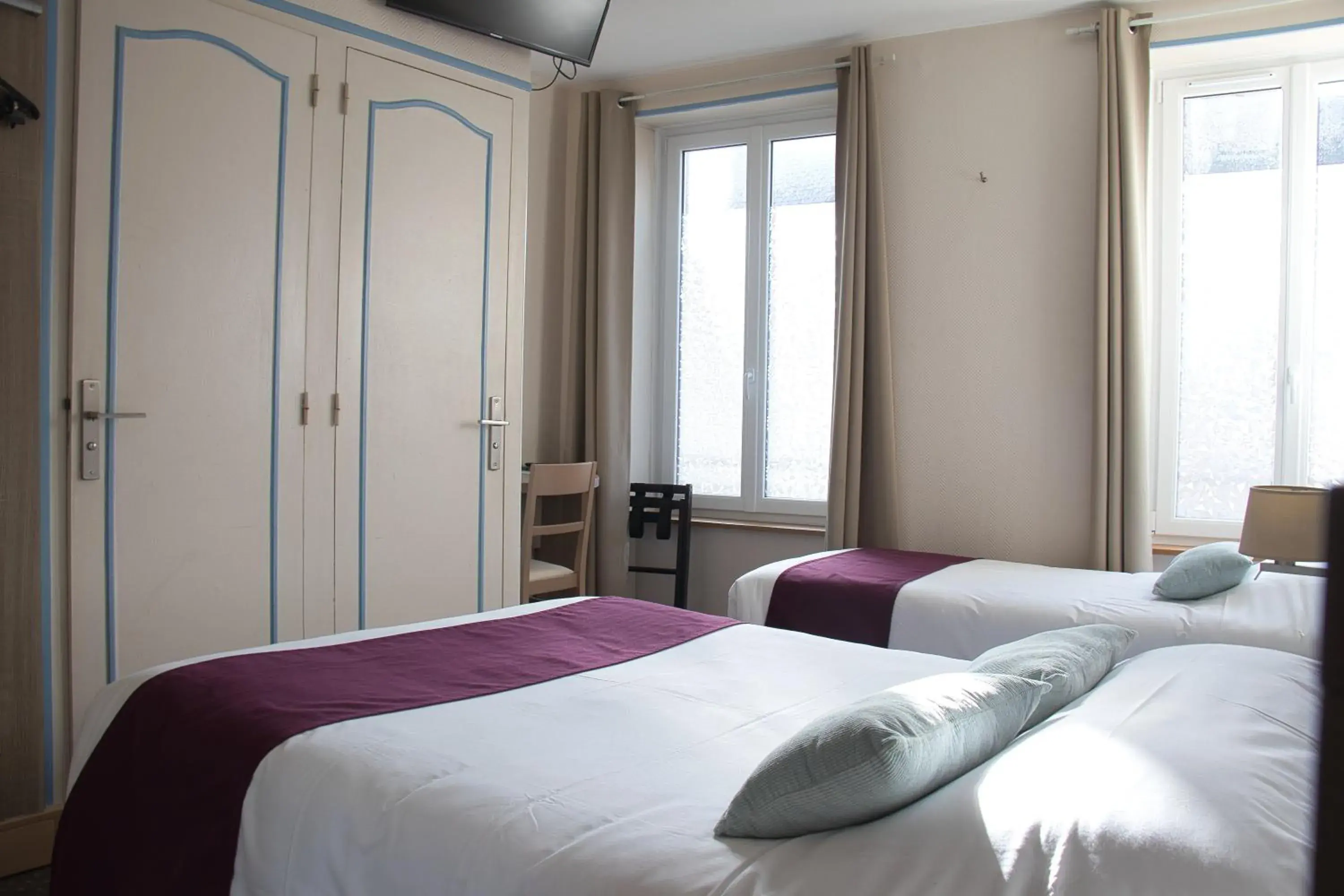 Bedroom, Bed in Cit'Hotel Hôtel Beauséjour Bedroom, Bed in Cit'Hotel Hôtel Beauséjour