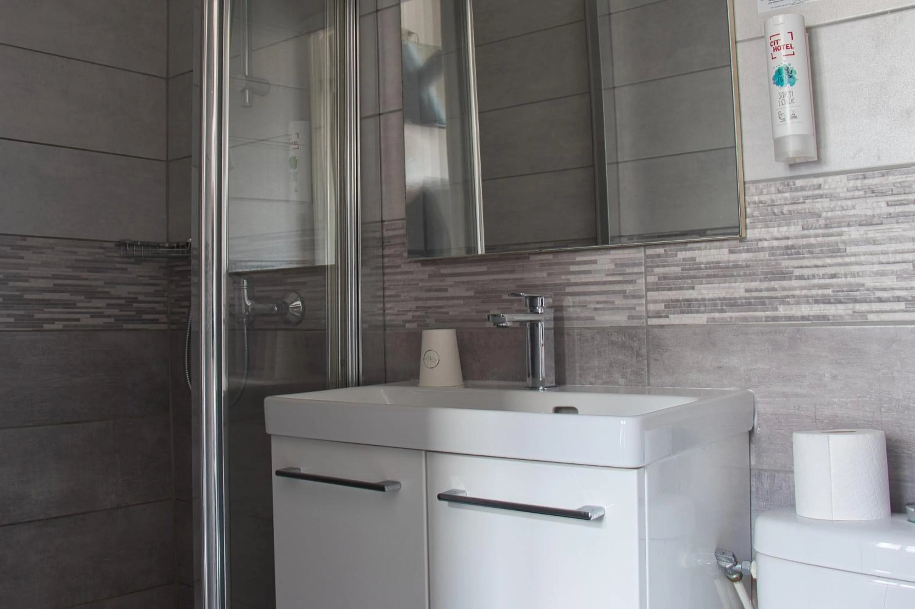 Bathroom in Cit'Hotel Hôtel Beauséjour