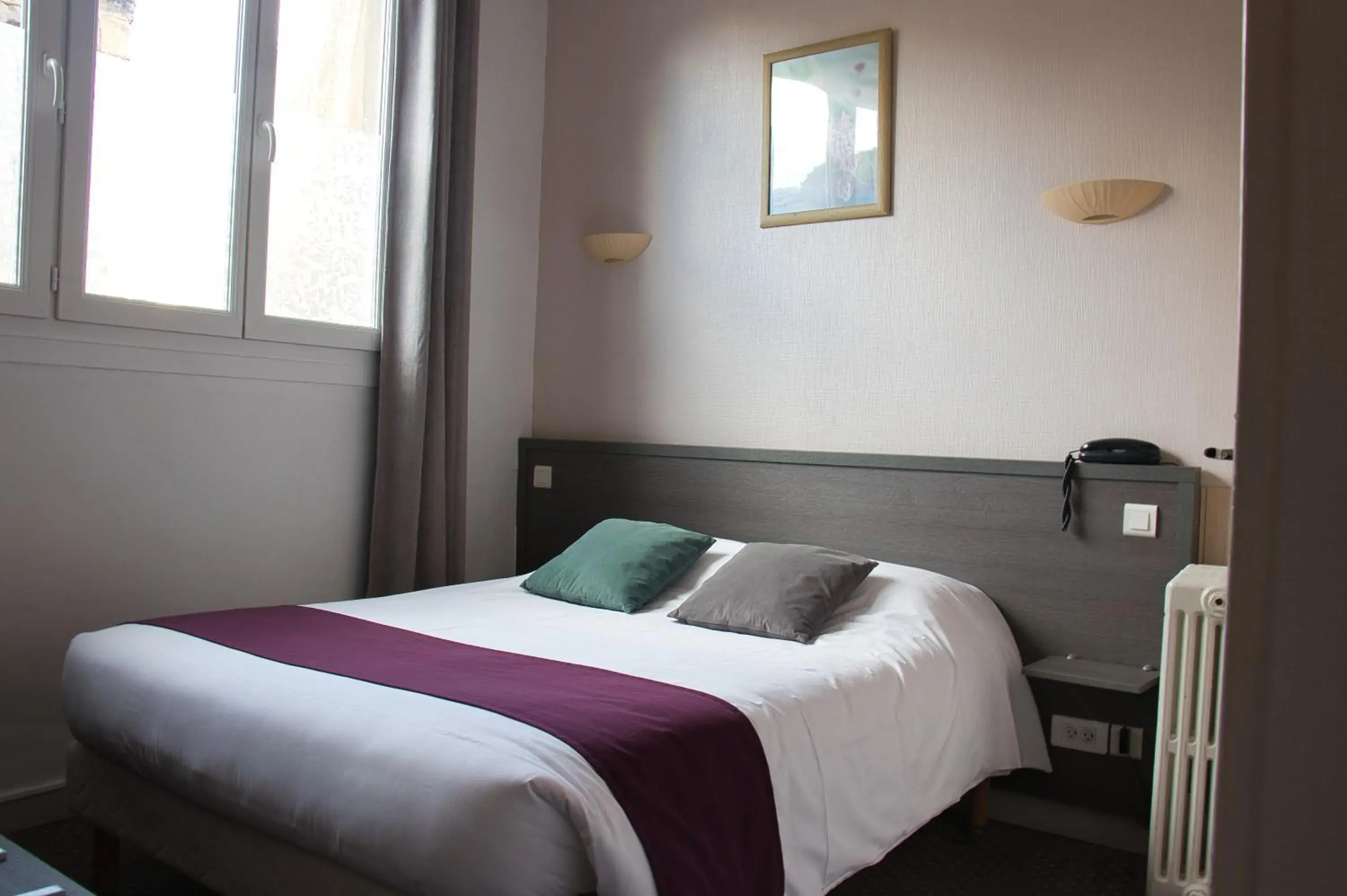 Bedroom, Bed in Cit'Hotel Hôtel Beauséjour Bedroom, Bed in Cit'Hotel Hôtel Beauséjour