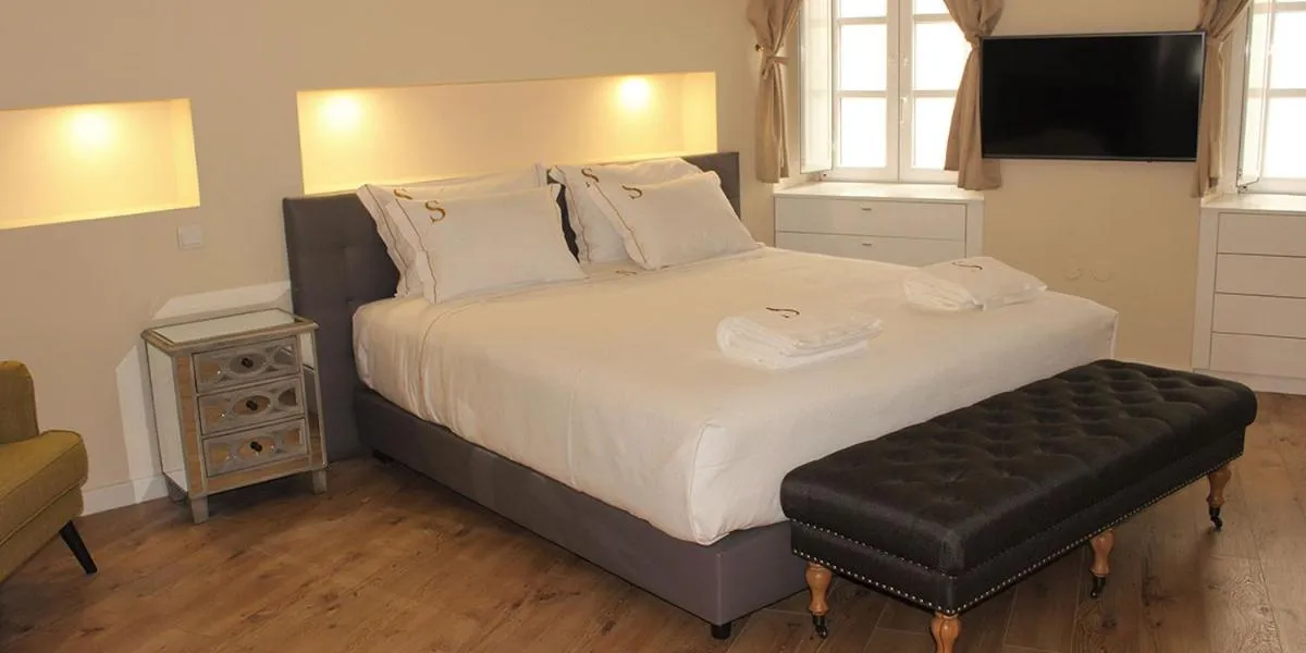 Bed in Suites Guest House