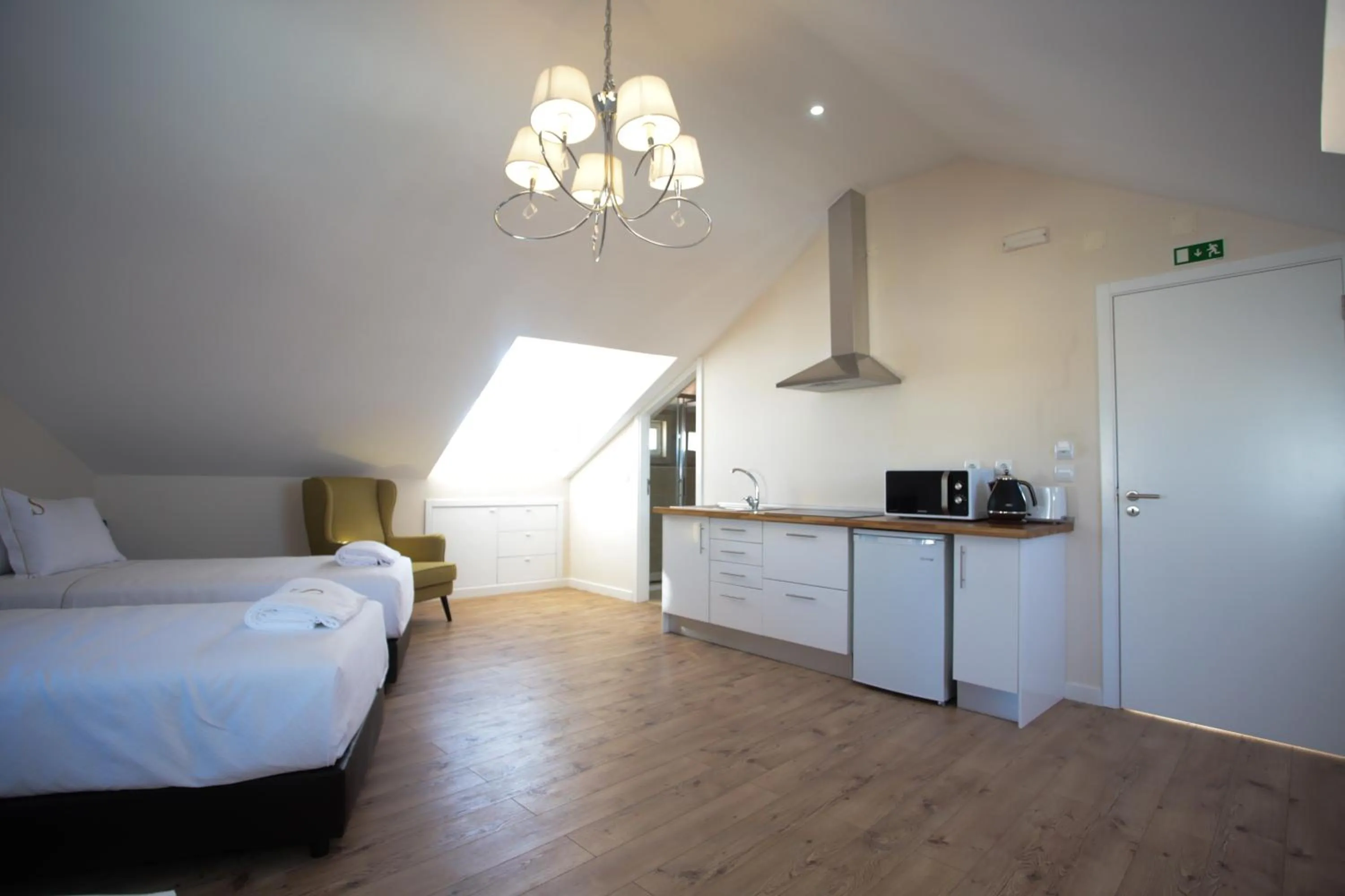 Bed in Suites Guest House