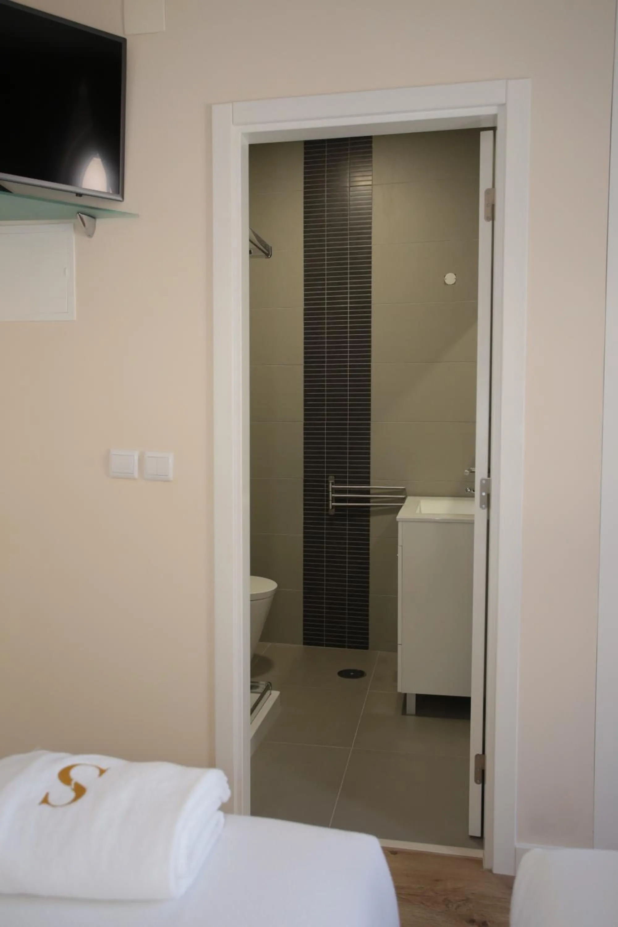 Bathroom, Bed in Suites Guest House