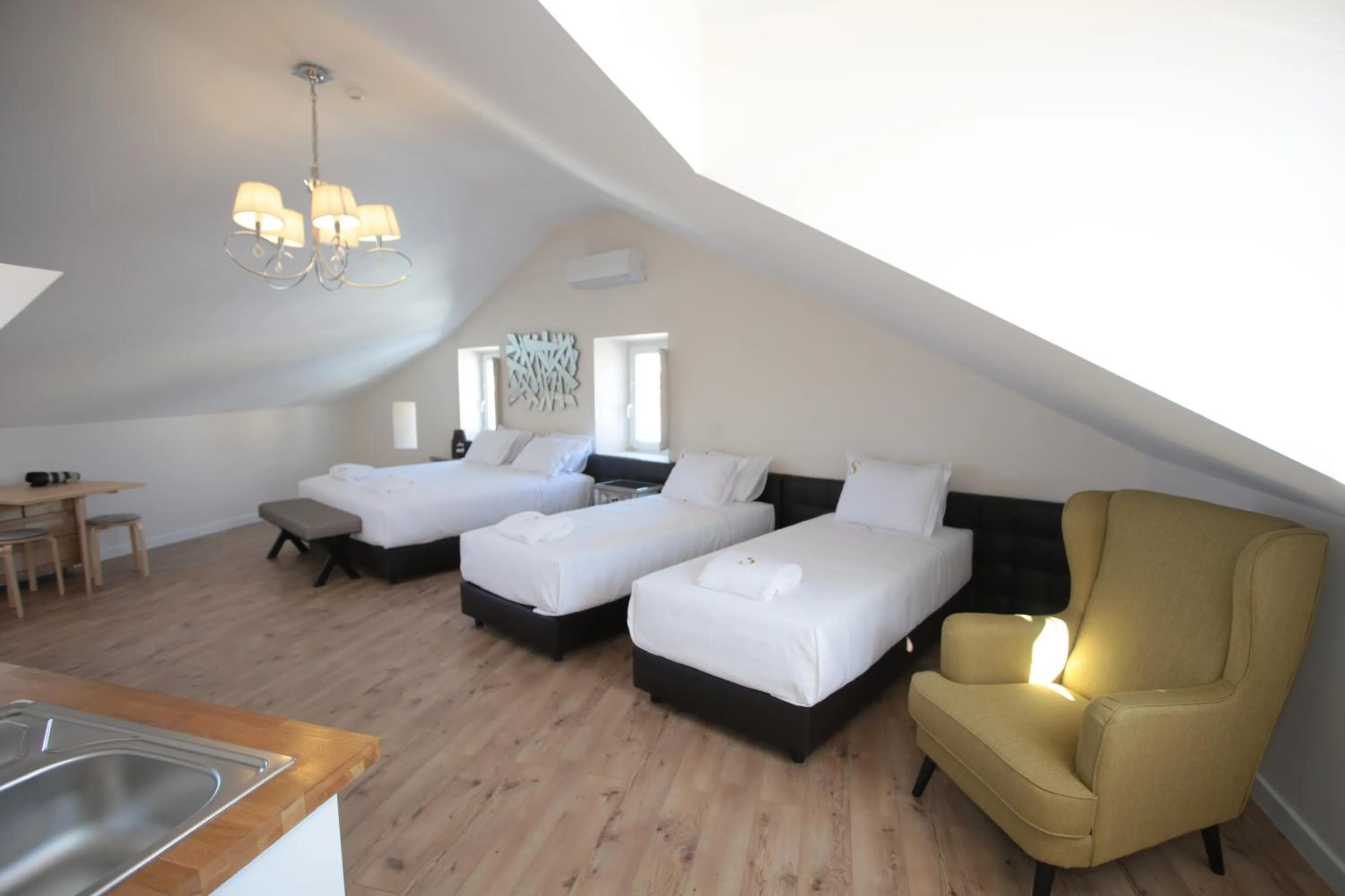 Bed in Suites Guest House