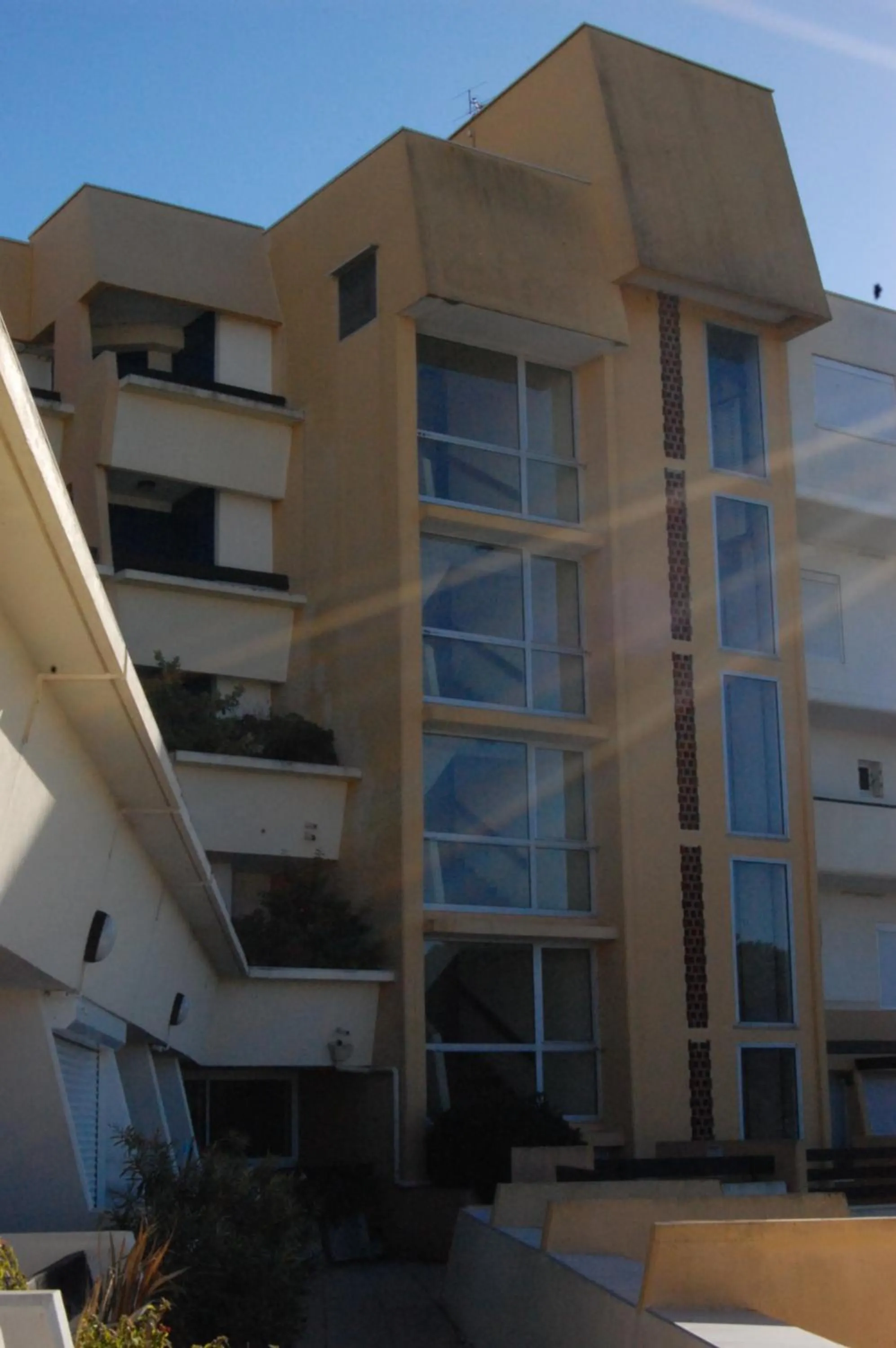 Property building in Au Coeur du Village Naturiste