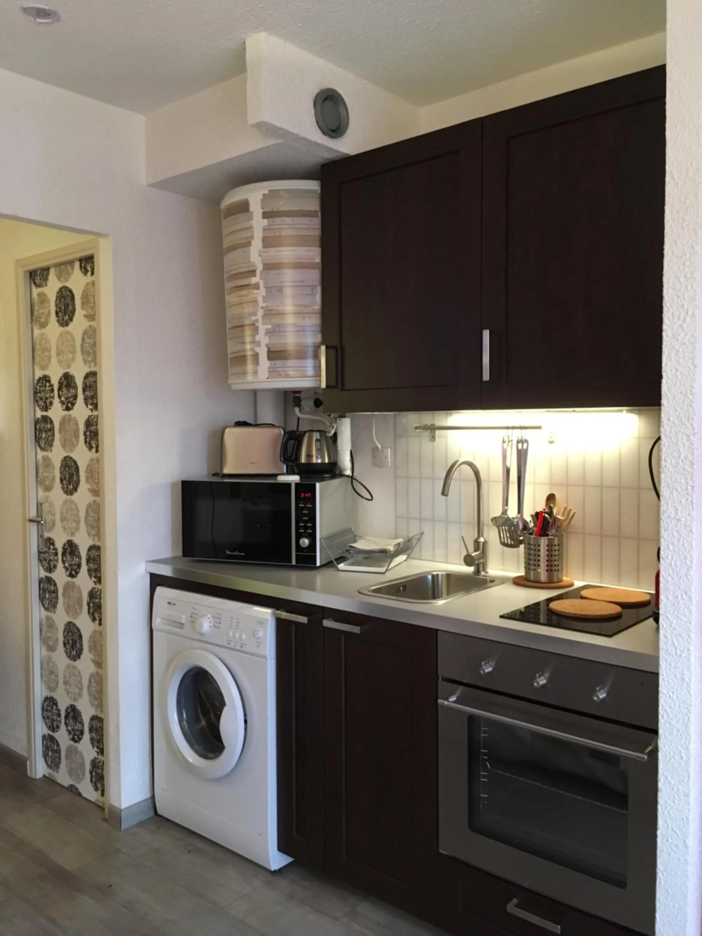 Kitchen or kitchenette in Au Coeur du Village Naturiste