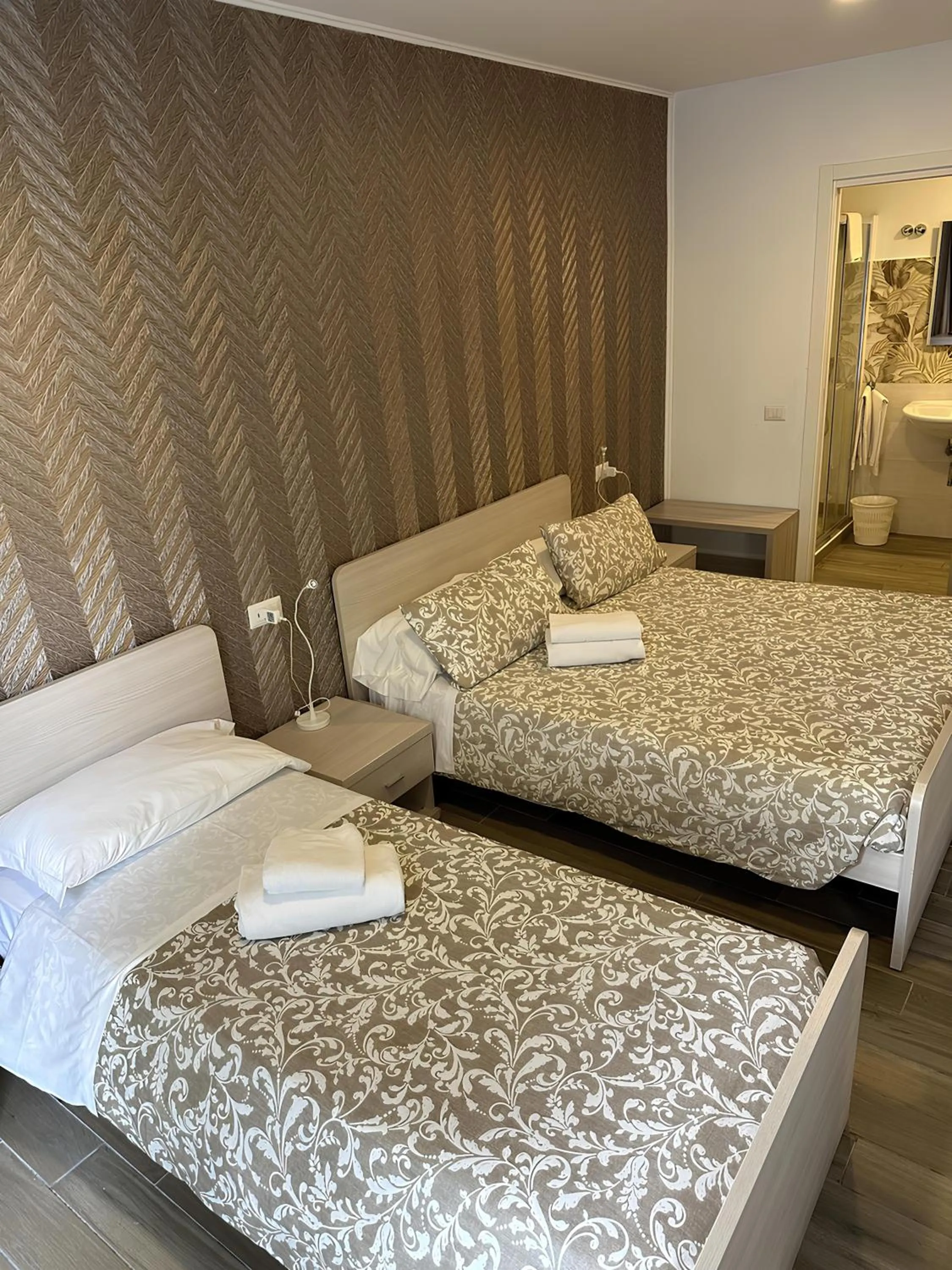 Bed in Academy Hotel