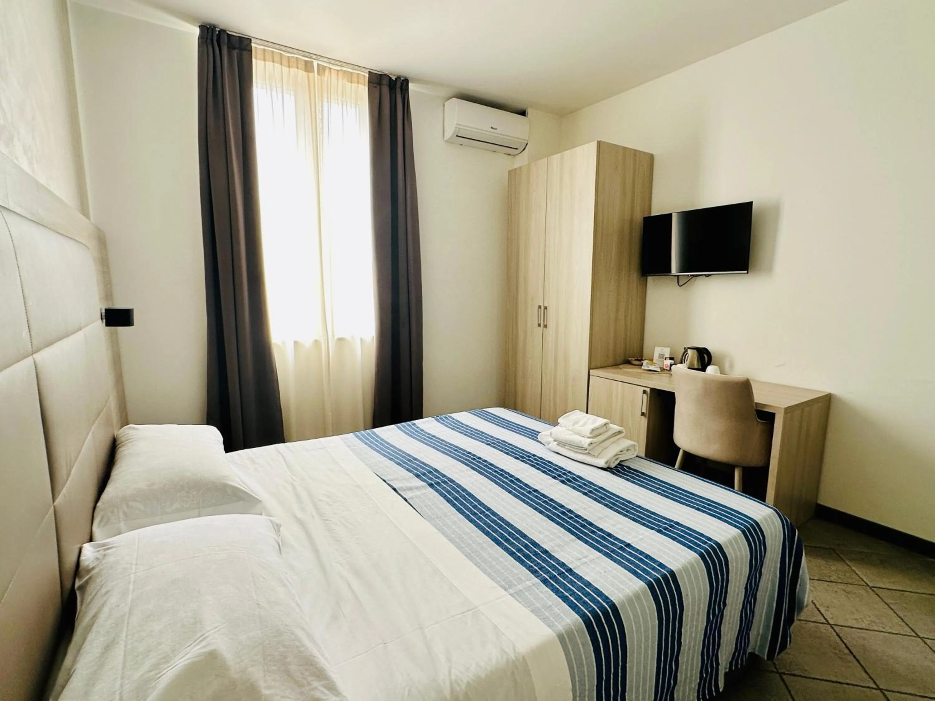 Bed in Academy Hotel