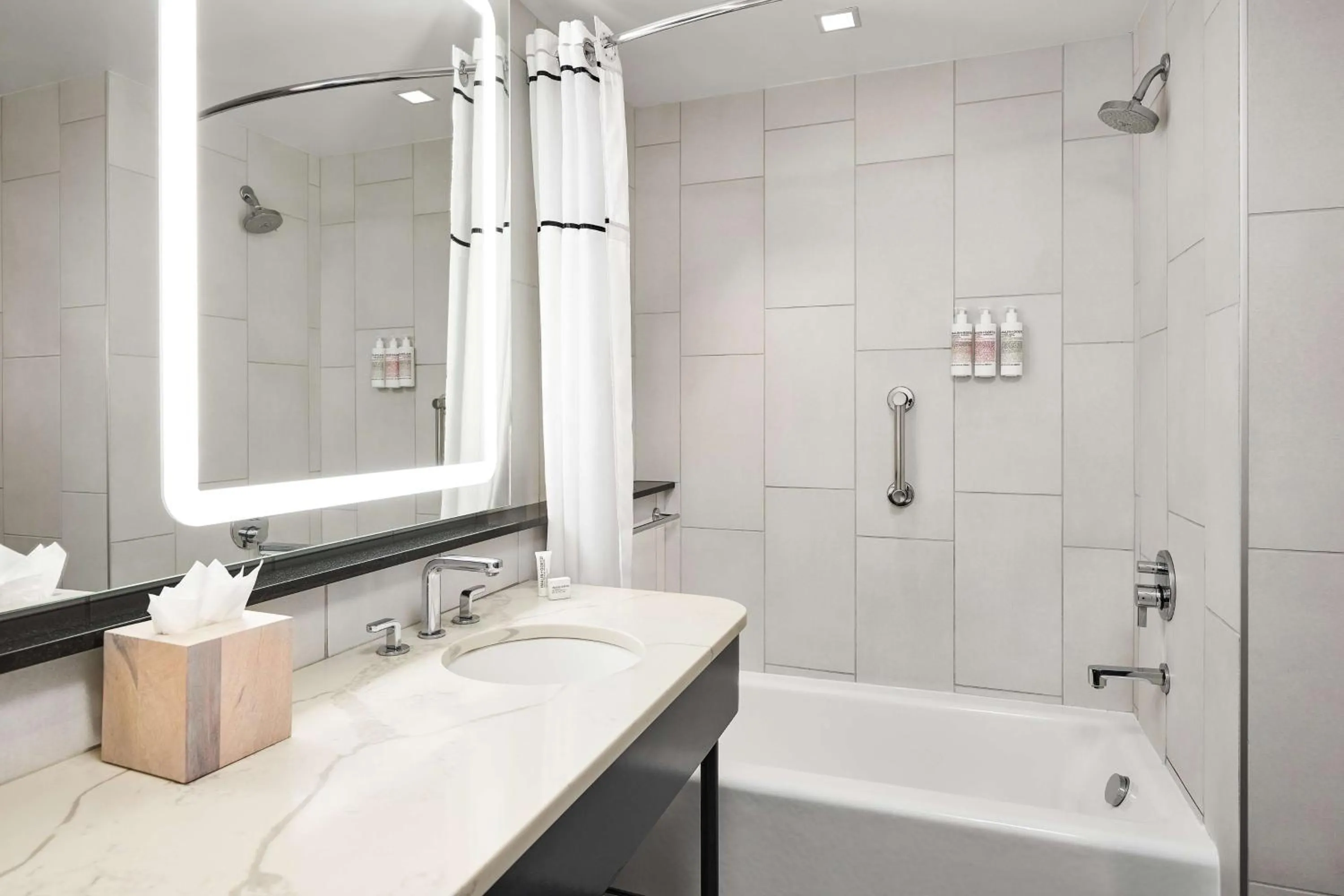 Bathroom in The Bankers Alley Hotel Nashville, Tapestry Collection by Hilton