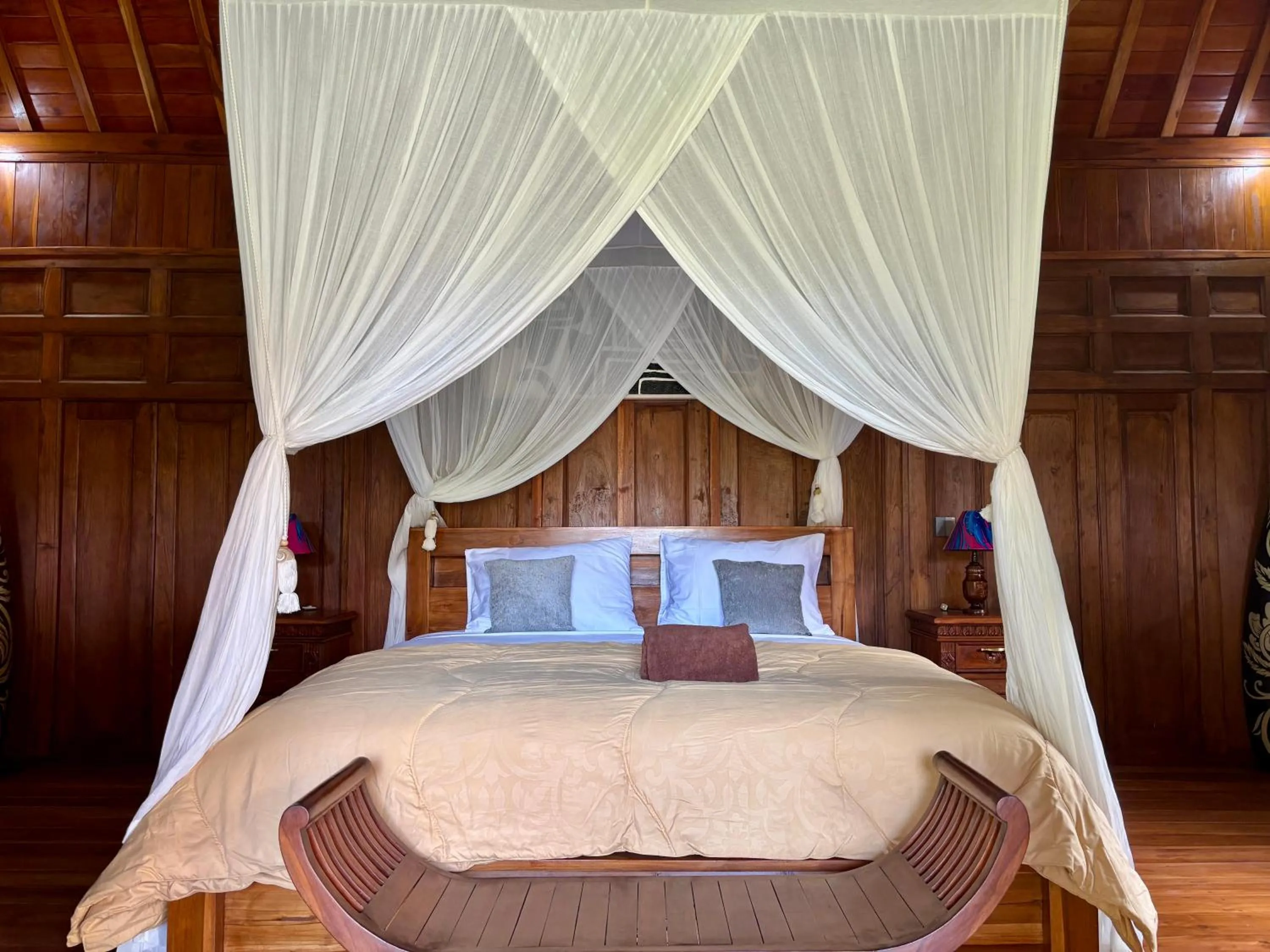 Bed in Di Abian Villas