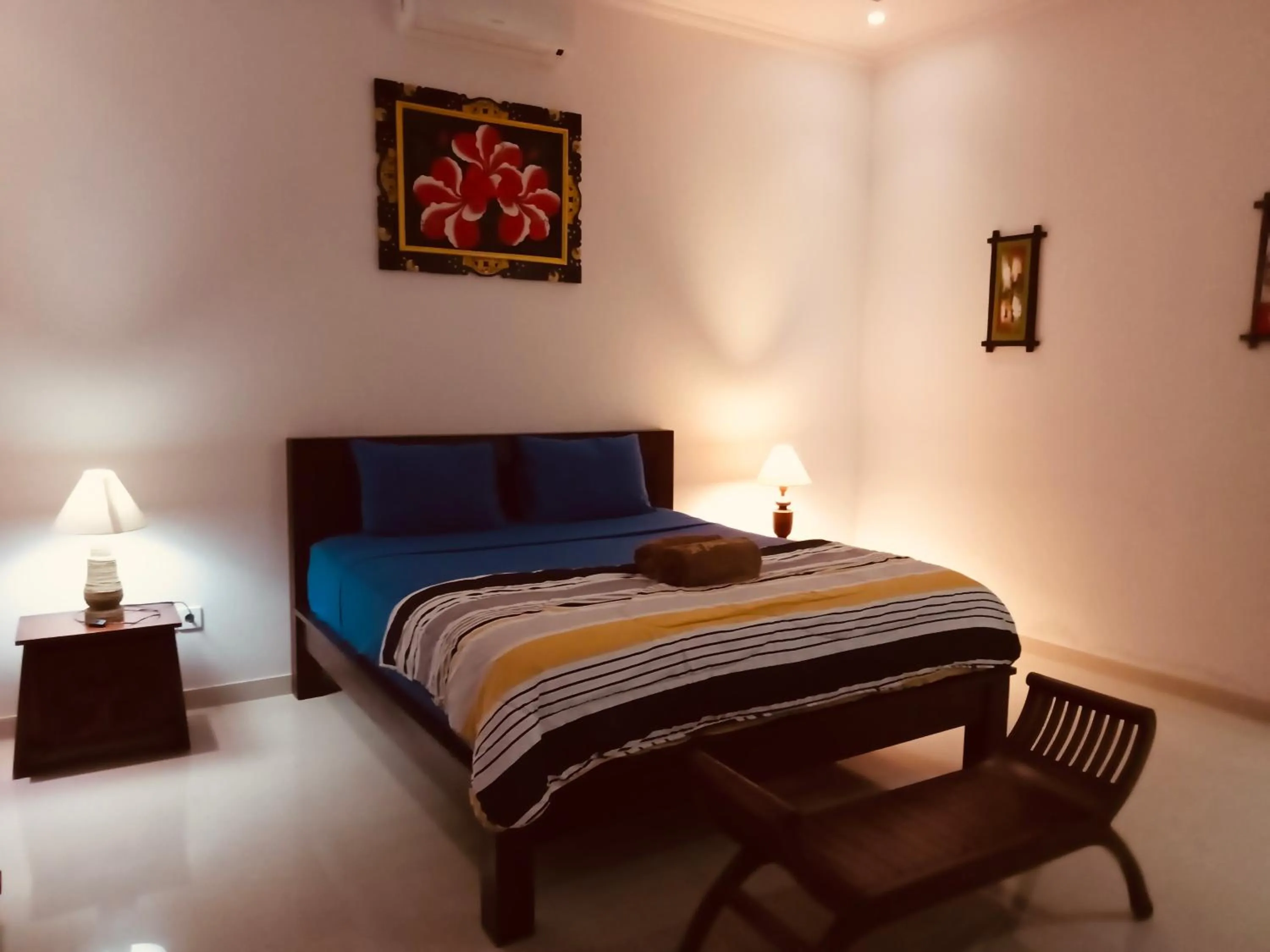 Bed in Di Abian Villas