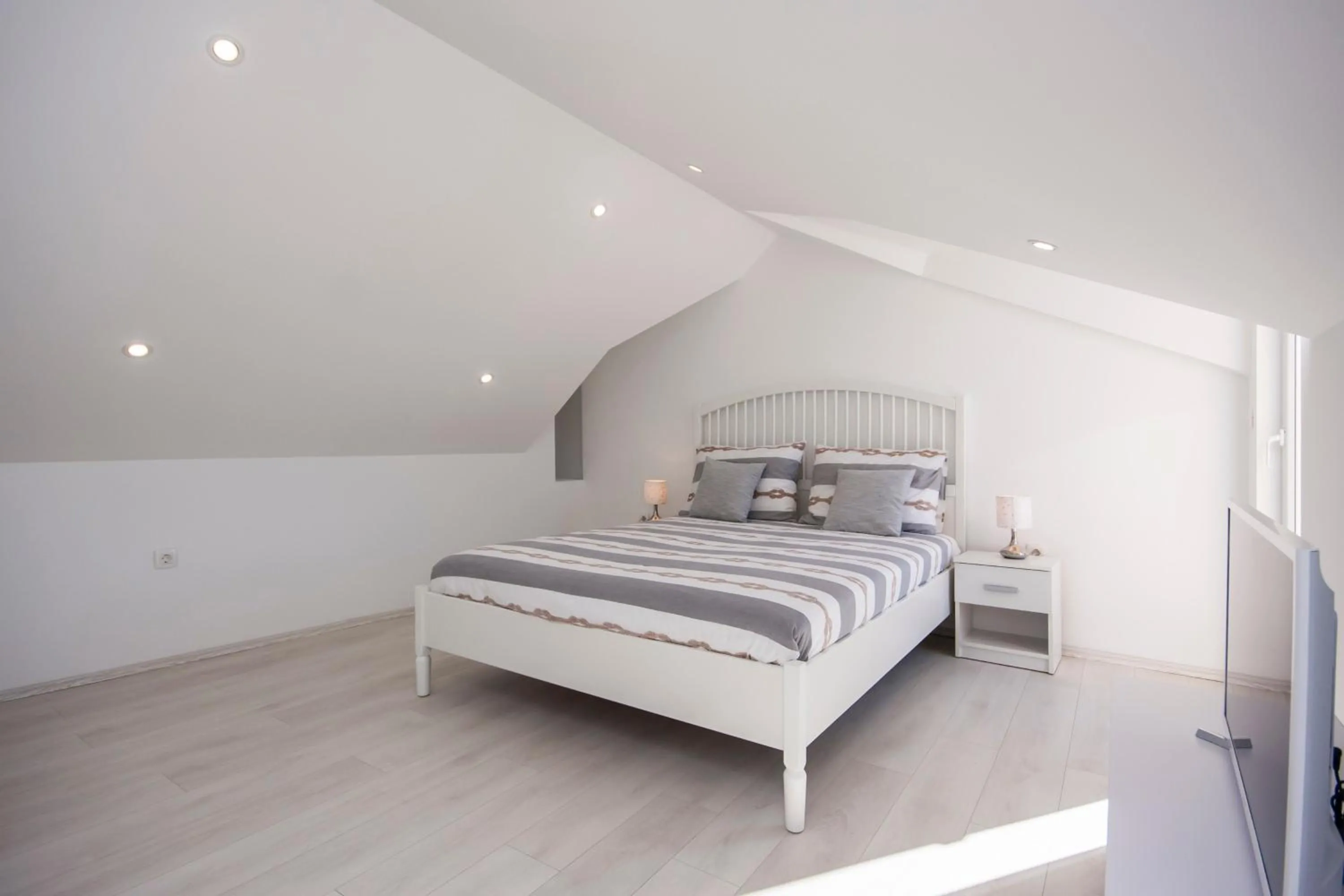 Bed in Apartments Dalmata