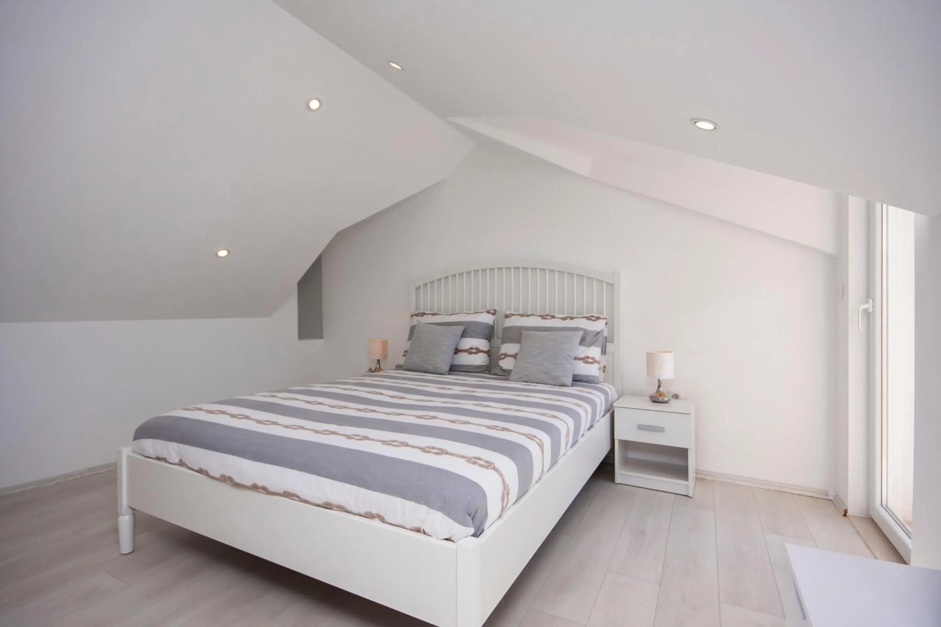 Bed in Apartments Dalmata
