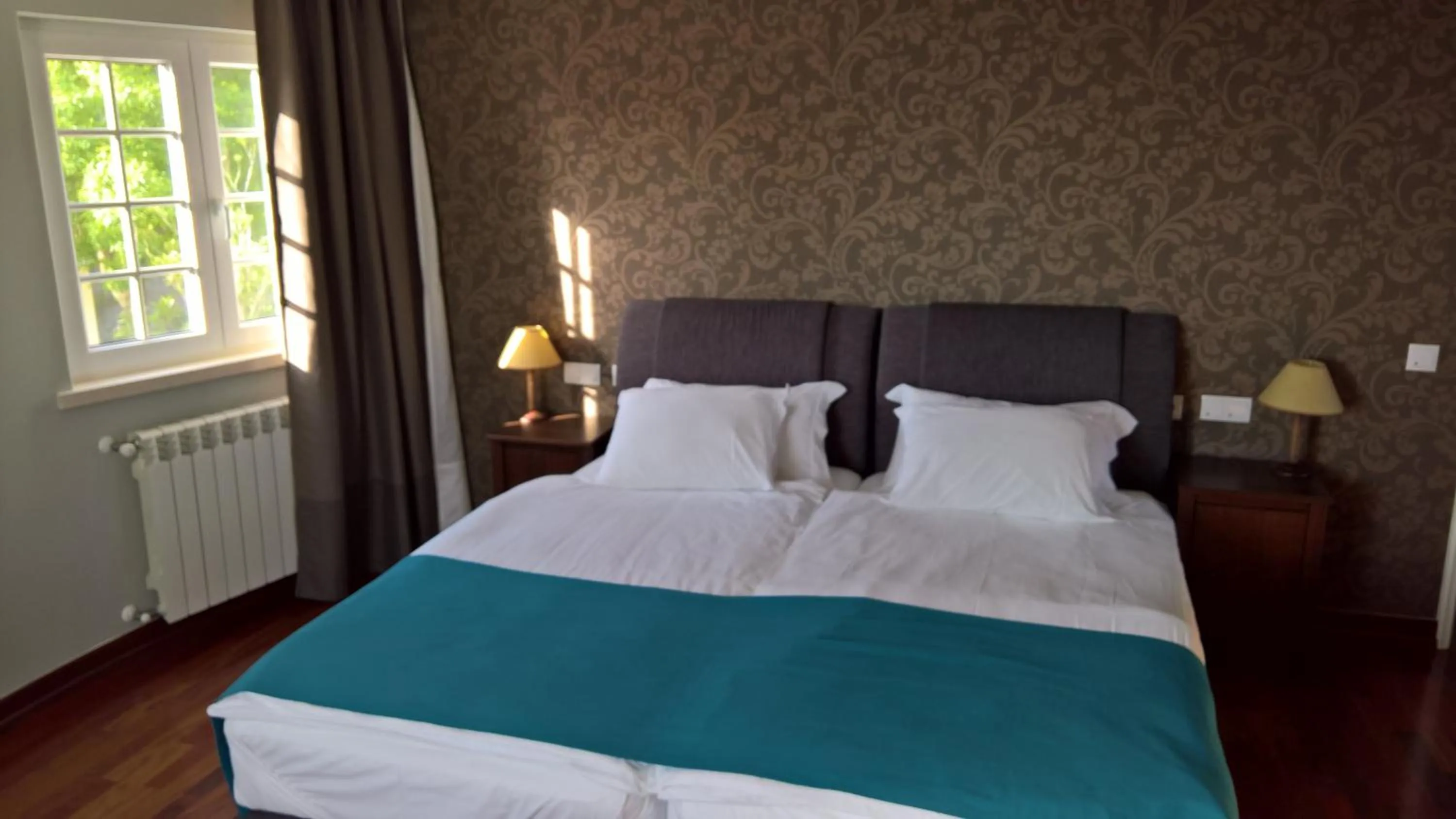 Photo of the whole room, Bed in Quinta do Cabo Guesthouse