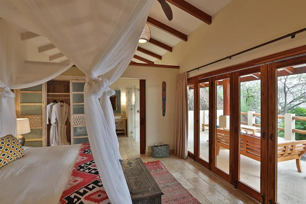 Bedroom, Bed in Casa Chameleon Hotel Las Catalinas - Adults Only