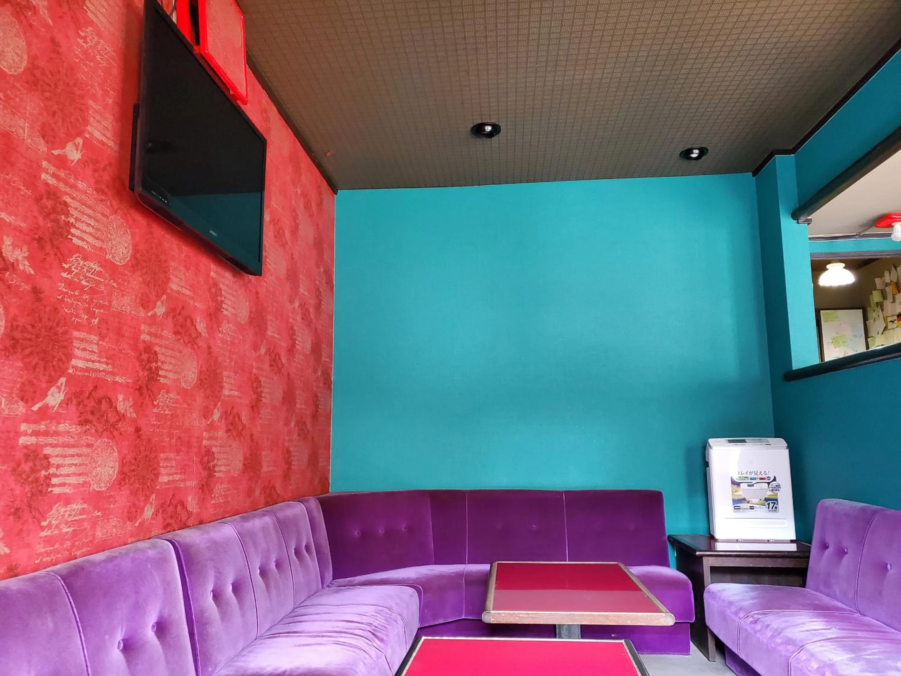 Communal lounge/ TV room in Naoshima Kowloon