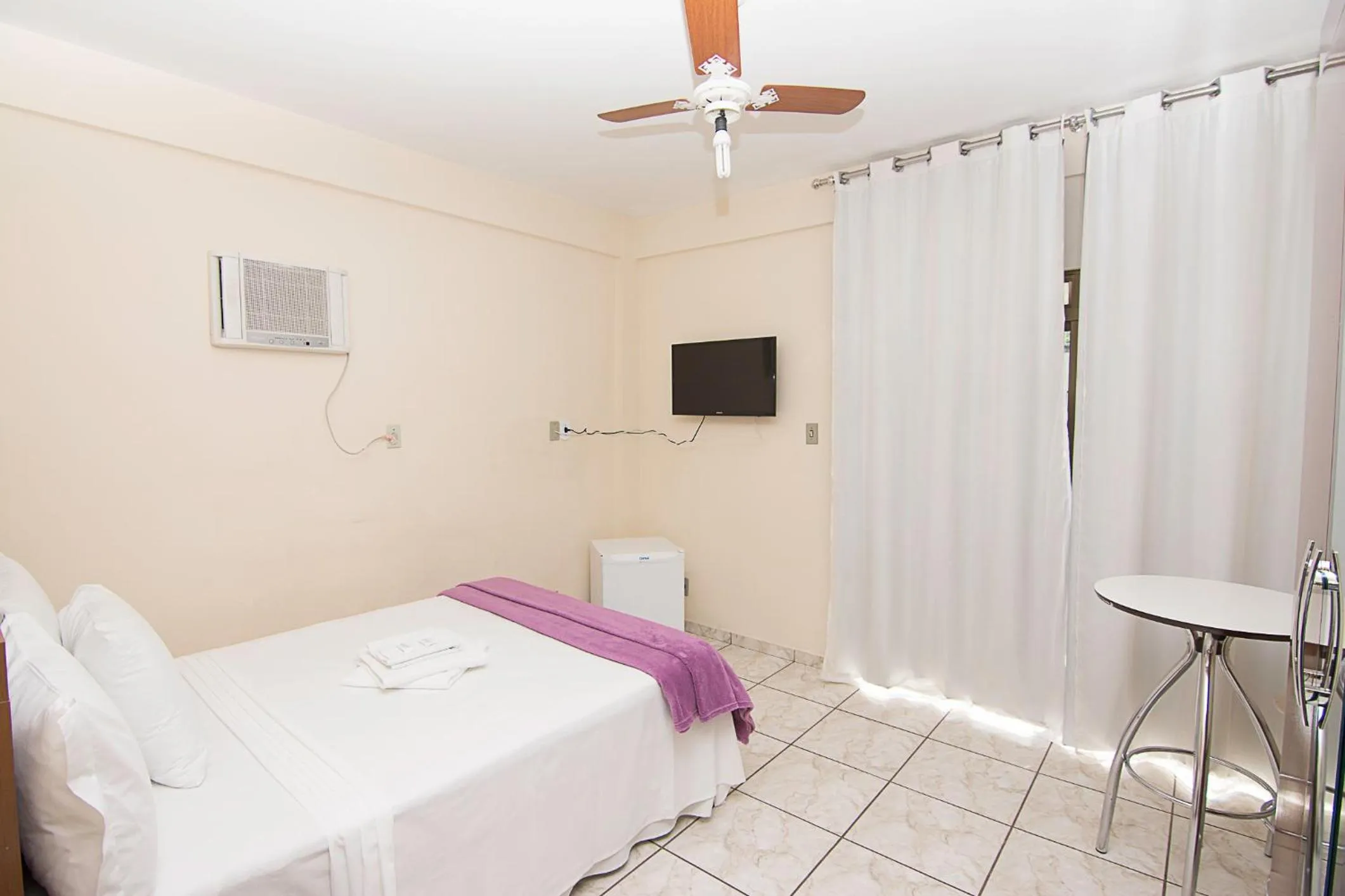 Bed in Gabvini Hotel