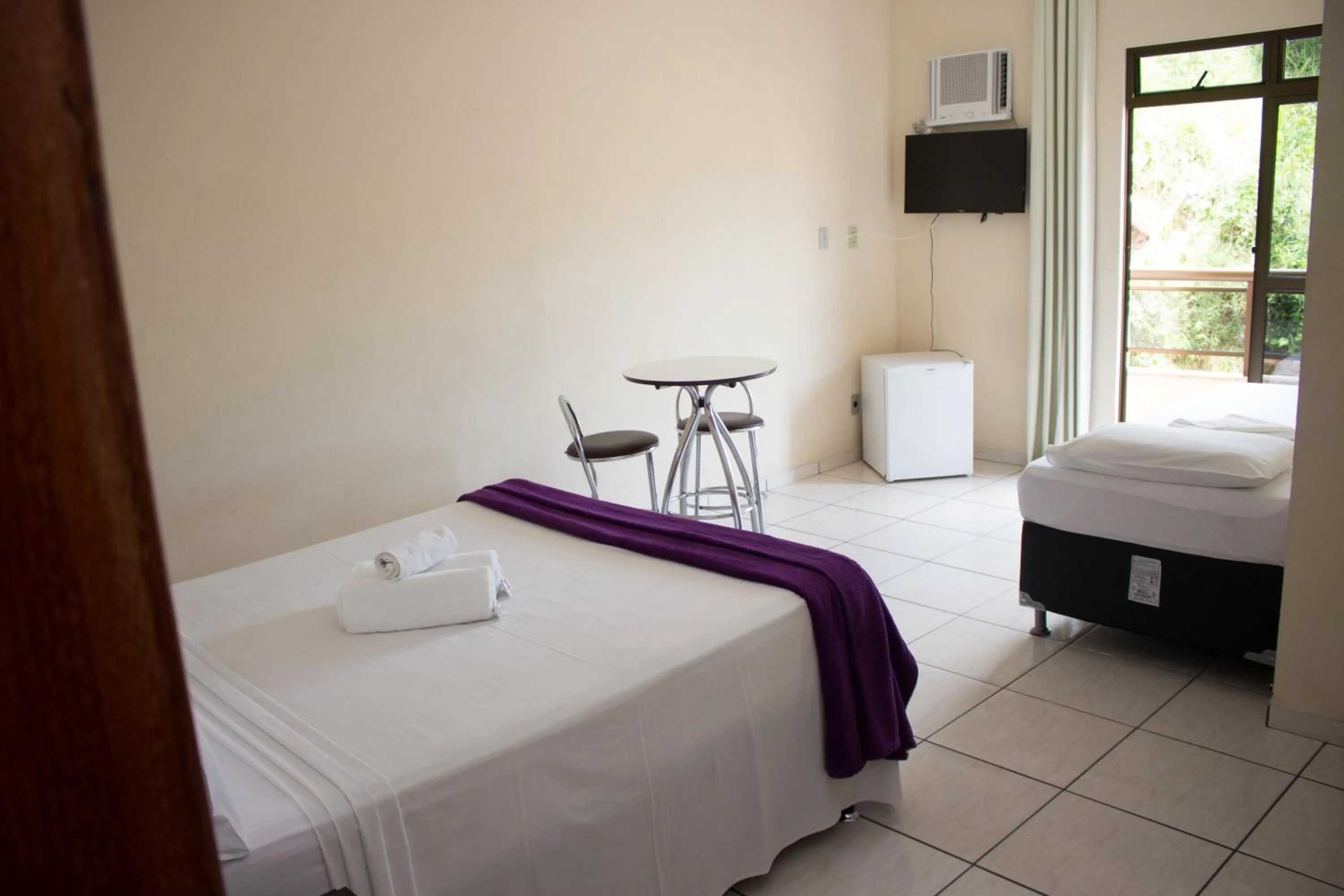 Bed in Gabvini Hotel