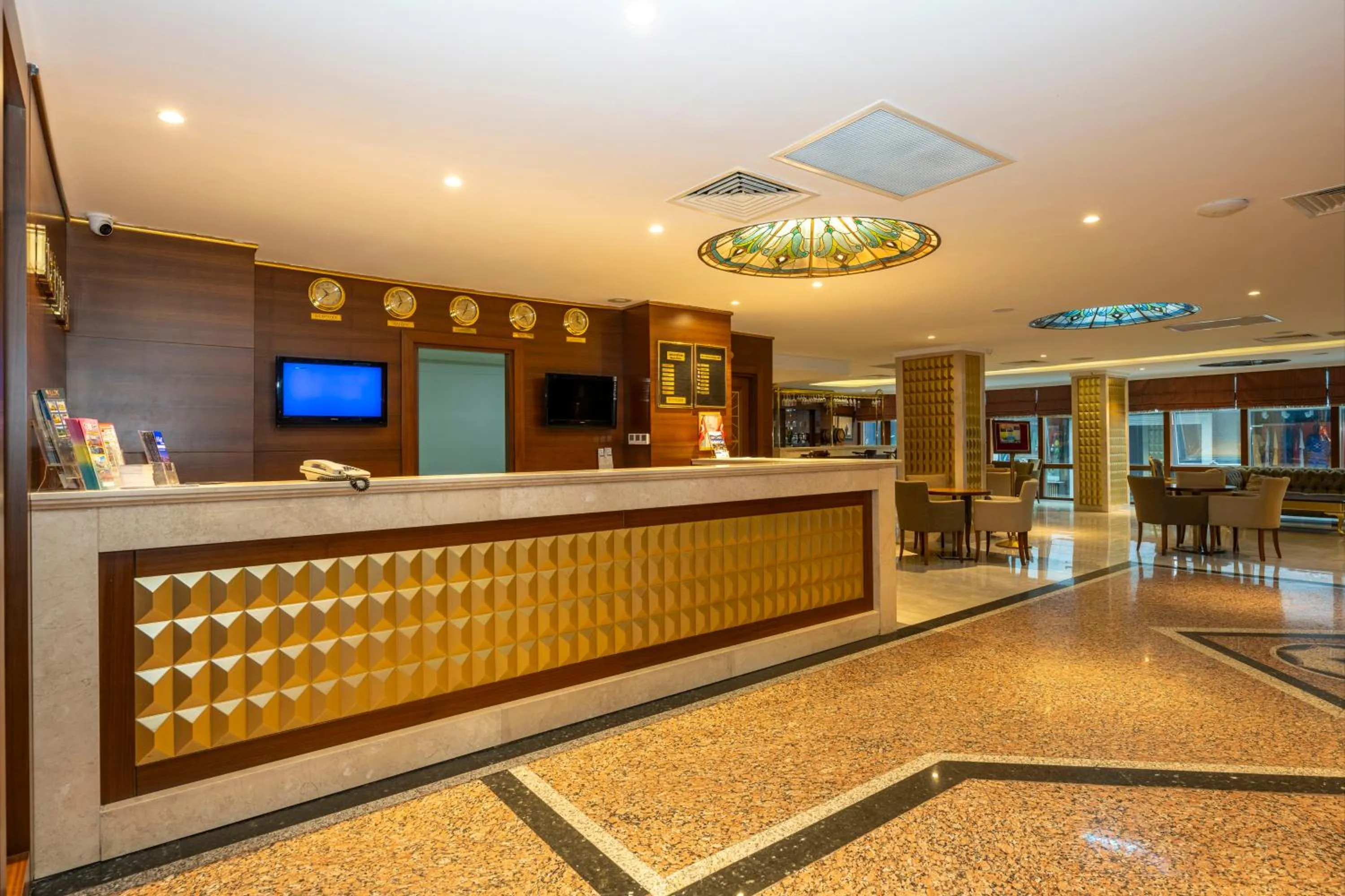 Communal lounge/ TV room in Dalan Otel