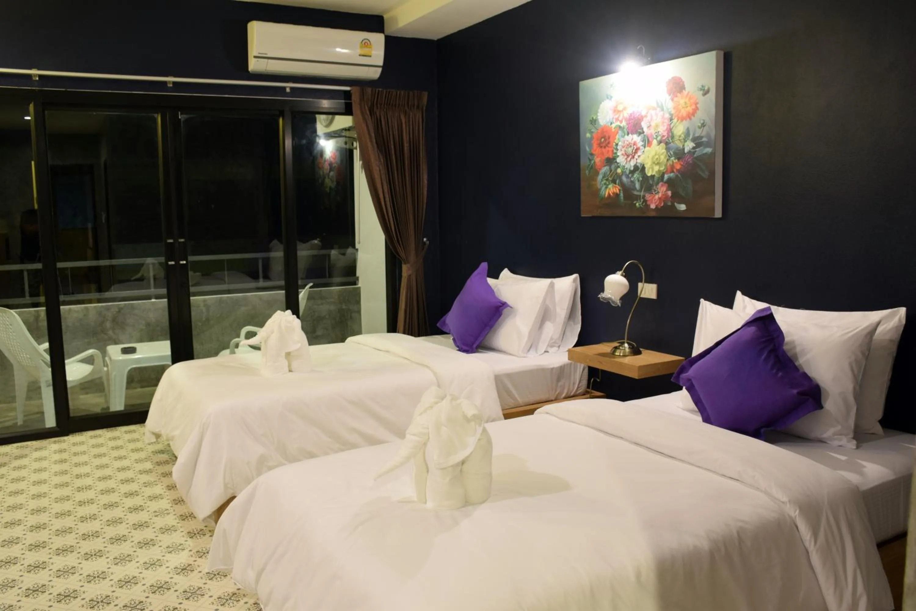 Photo of the whole room, Bed in At Home Khaolak