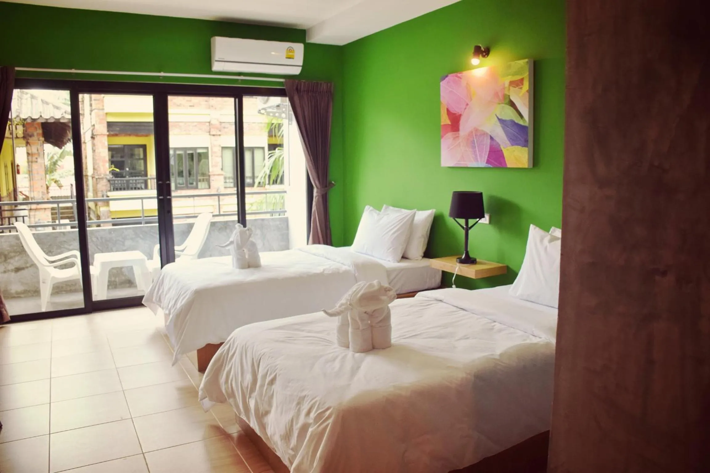 Photo of the whole room, Bed in At Home Khaolak