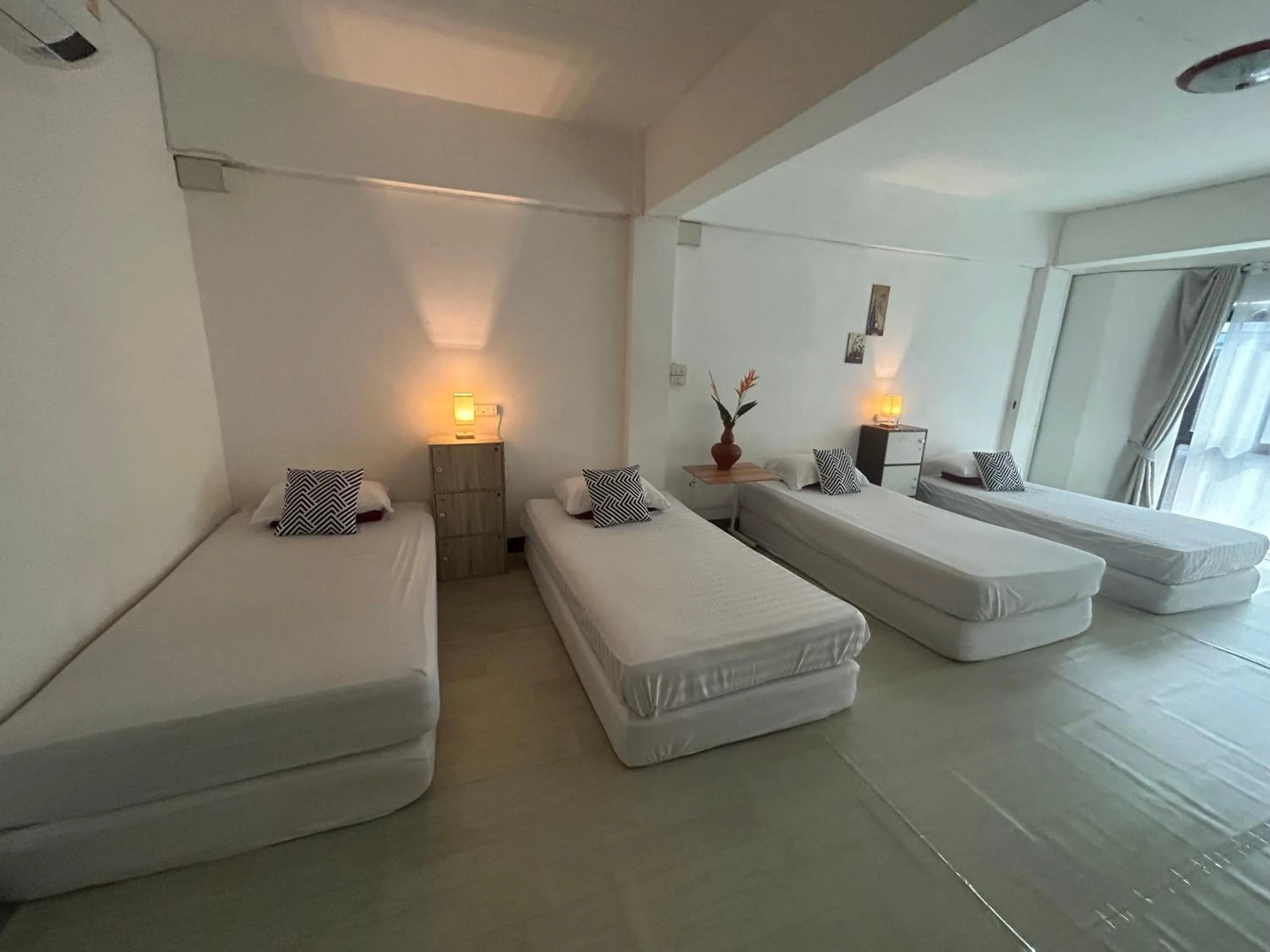 Standard Quadruple Room - single occupancy in Monkey Toe Guesthouse