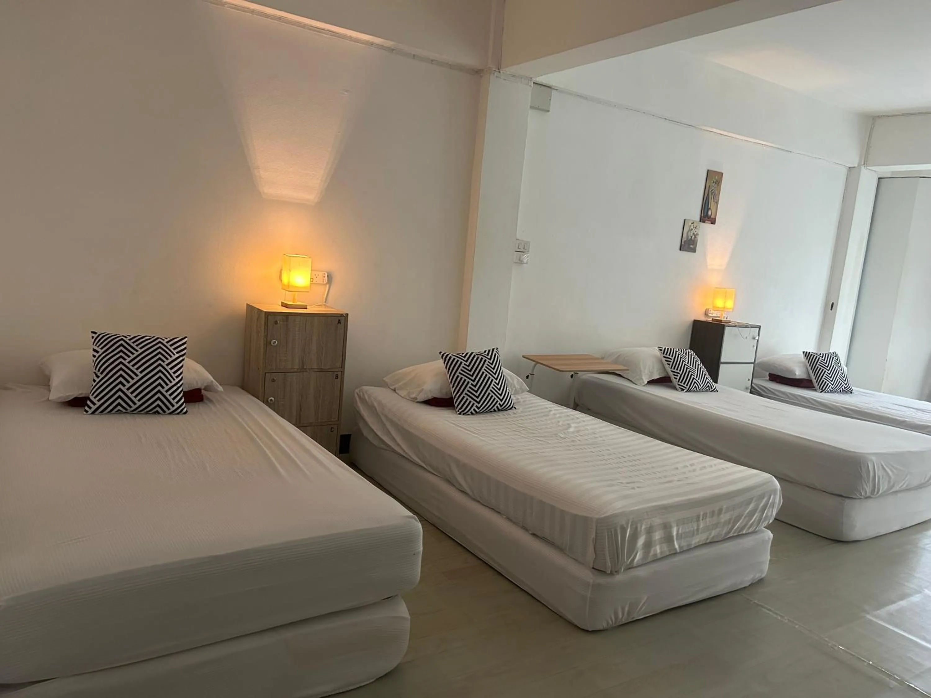 Standard Quadruple Room - single occupancy in Monkey Toe Guesthouse