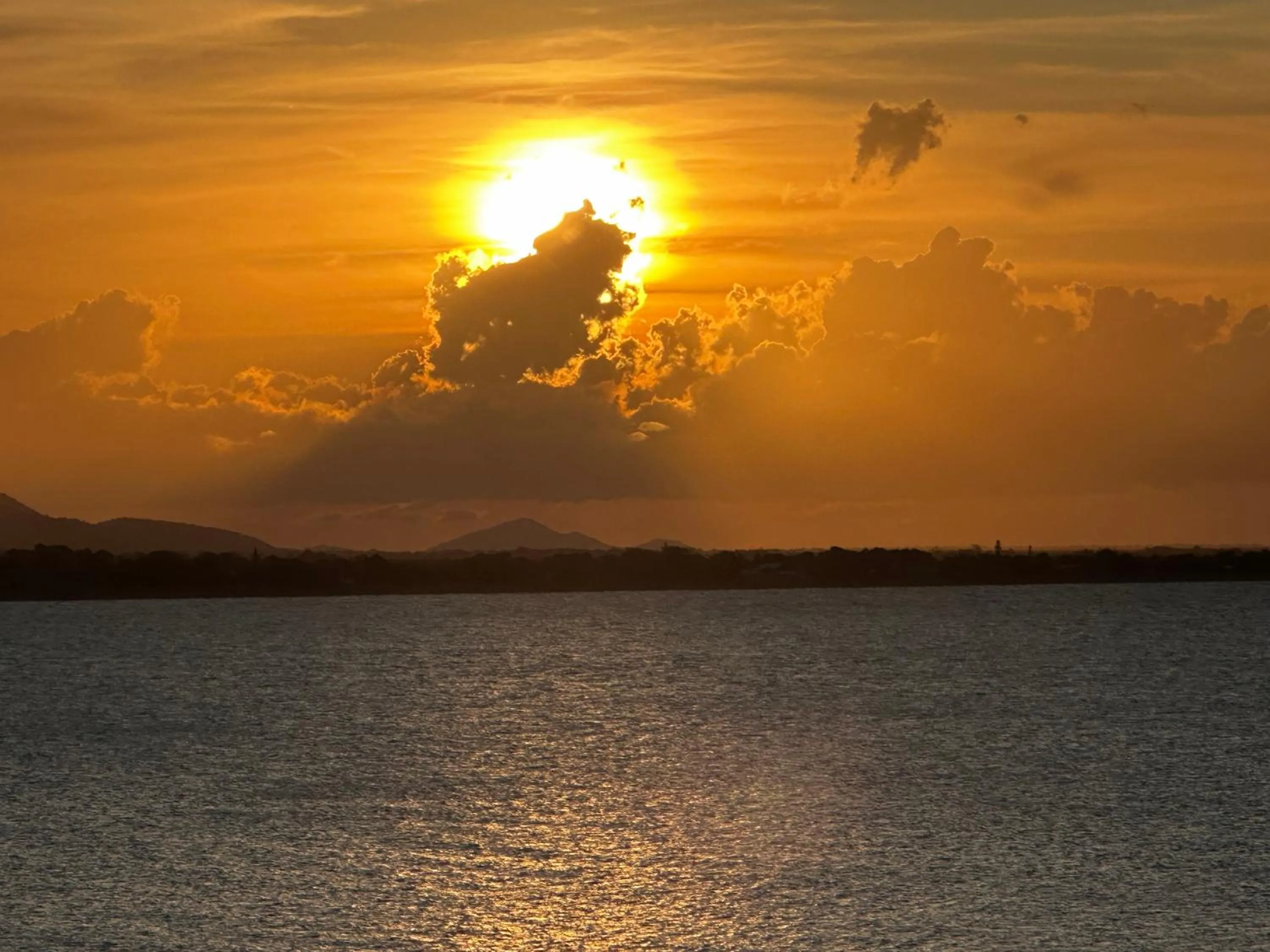 Sunset in Coral Cove Apartments - Absolute Beachfront Resort Bowen