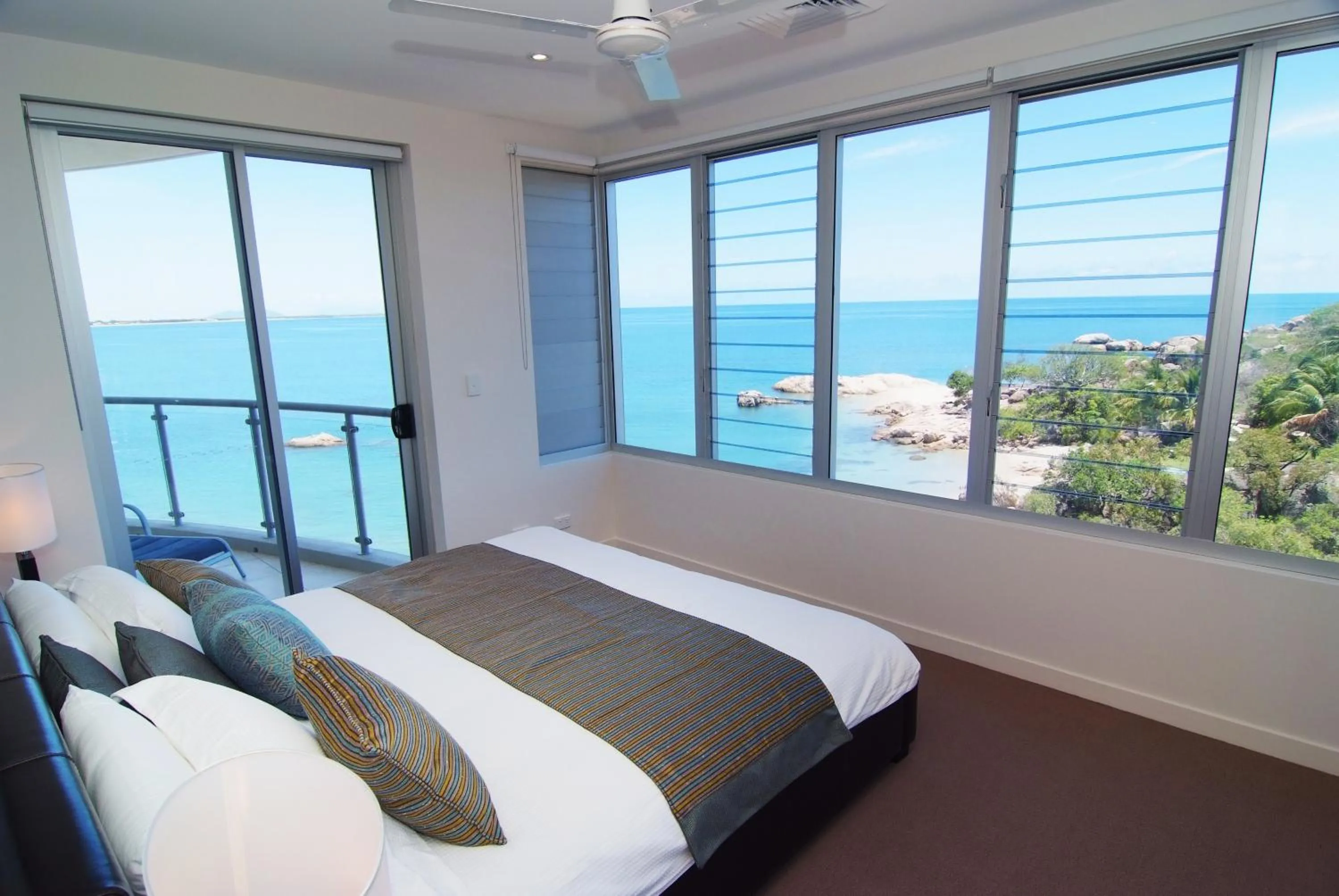Bedroom, Bed in Coral Cove Apartments - Absolute Beachfront Resort Bowen