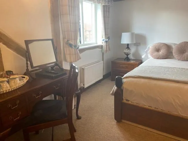 Bed in The Inglenook Hotel