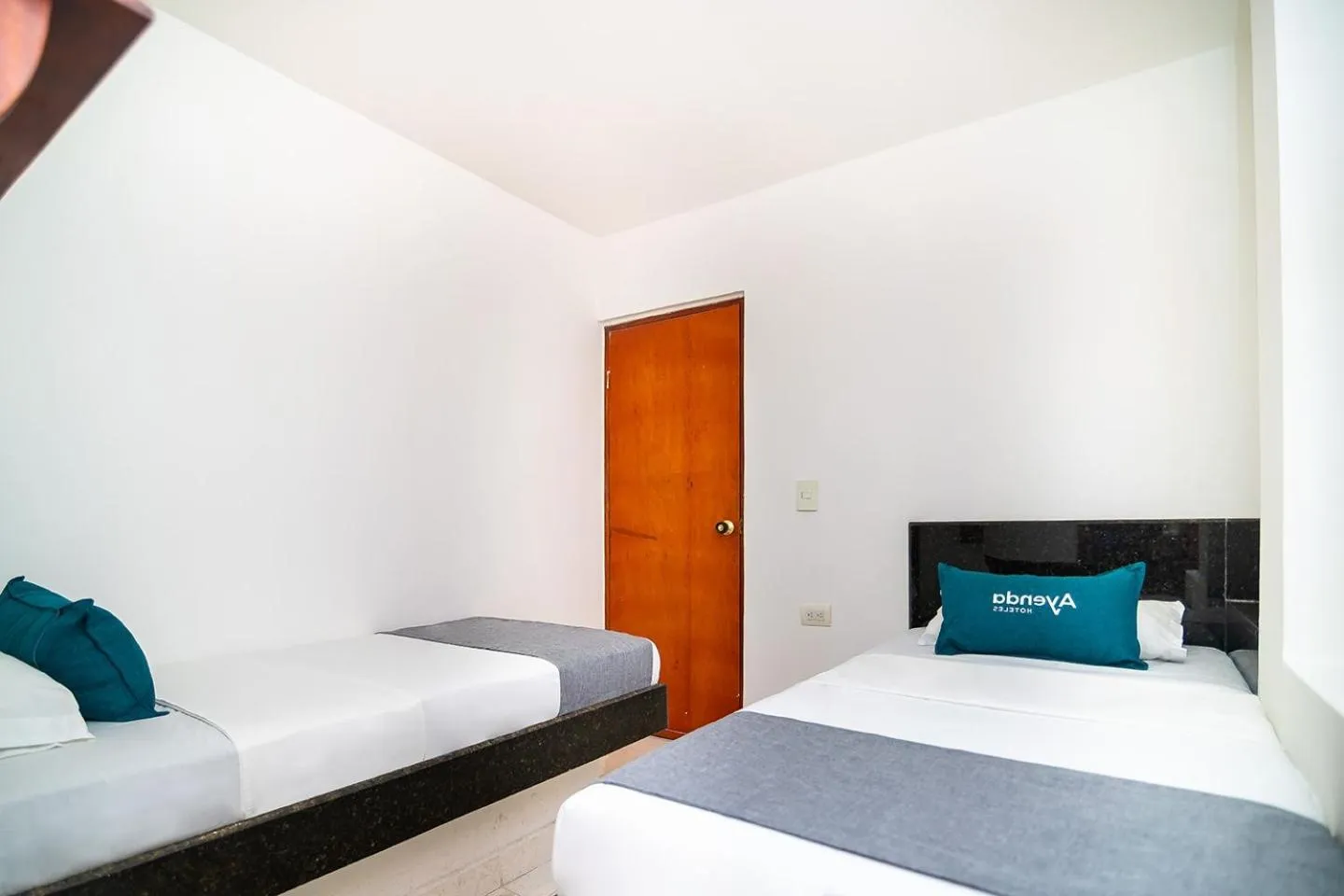 Bed in Hotel Esperanza AC