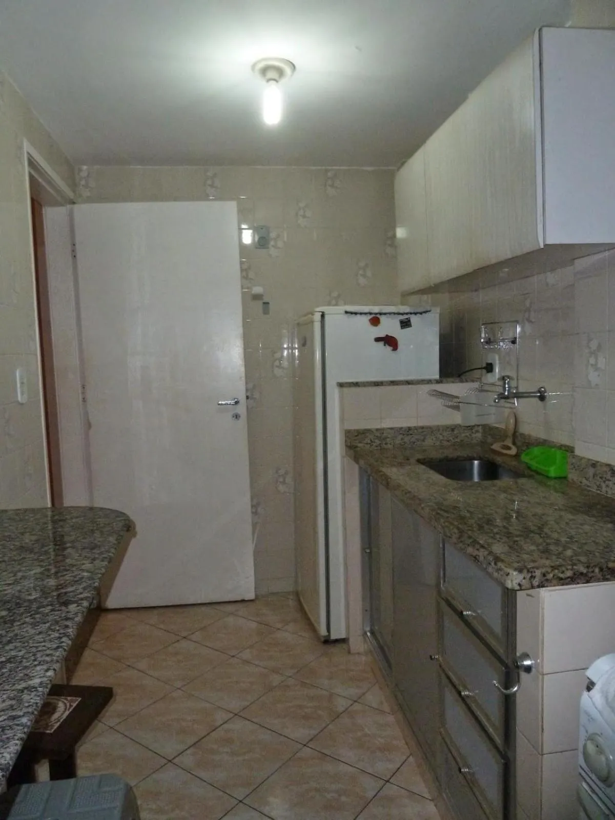 Kitchen or kitchenette in Apto Temporada Cabo Frio