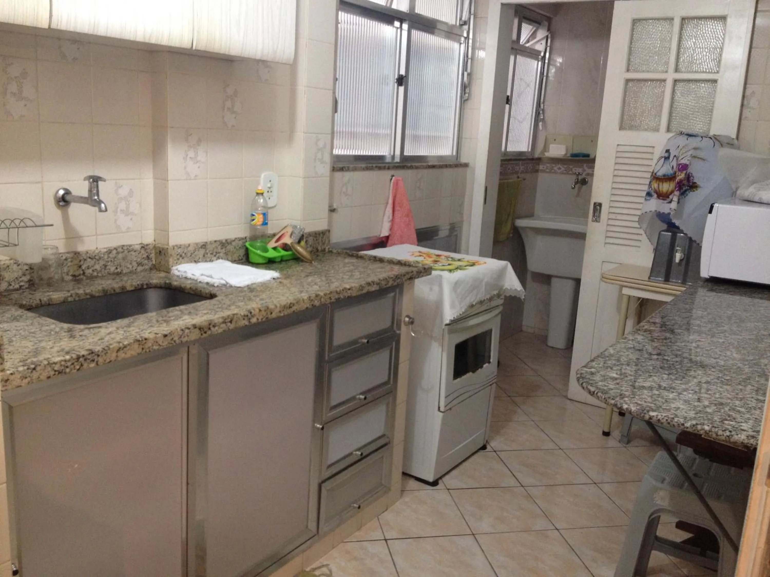 Kitchen or kitchenette in Apto Temporada Cabo Frio