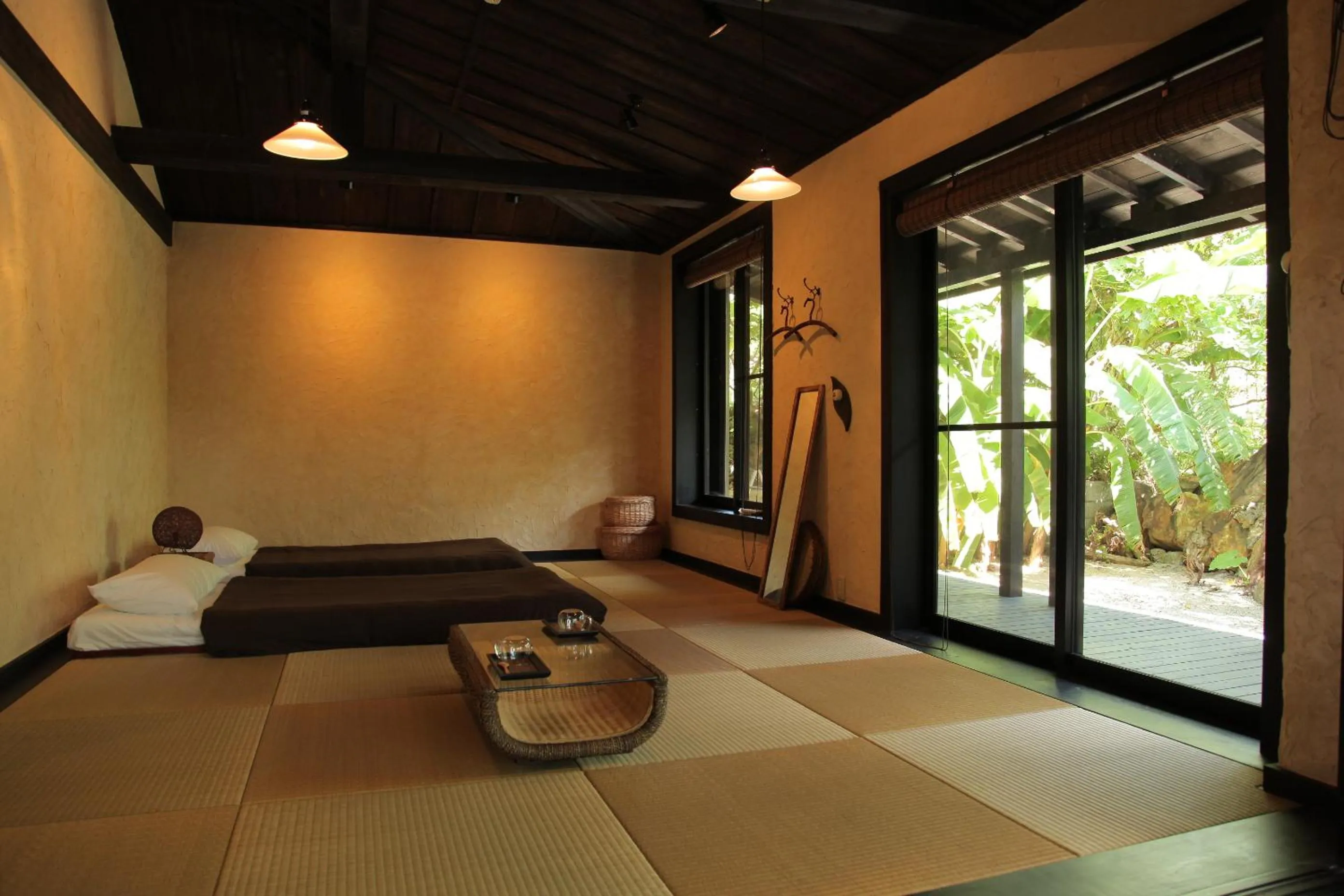 Photo of the whole room, Bed in Taketomijima Akaneya