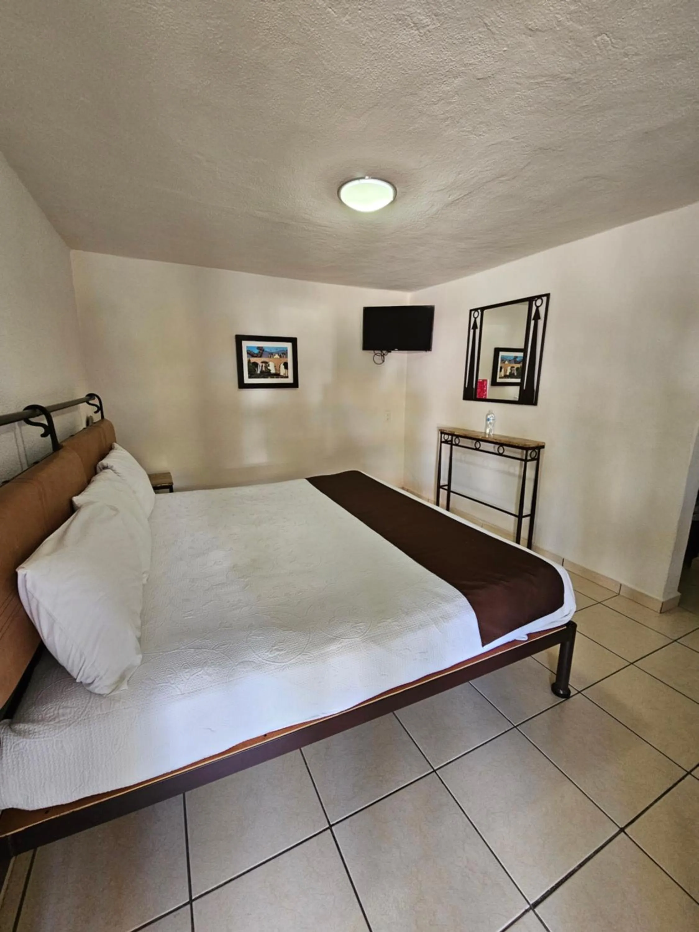 Bed in Hotel Ejecutivo Aeropuerto