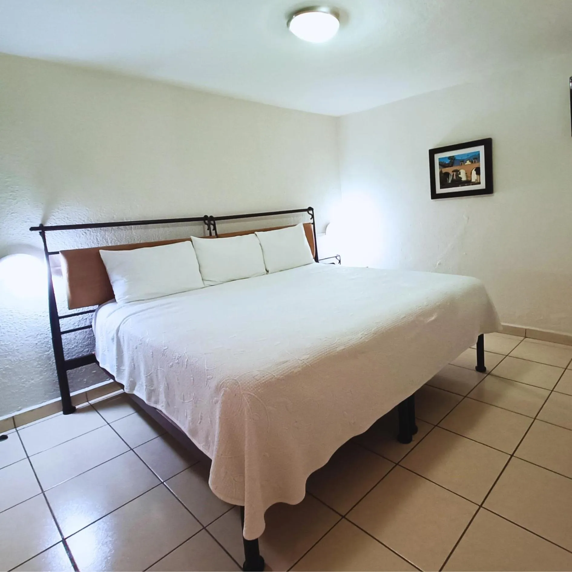 Bed in Hotel Ejecutivo Aeropuerto