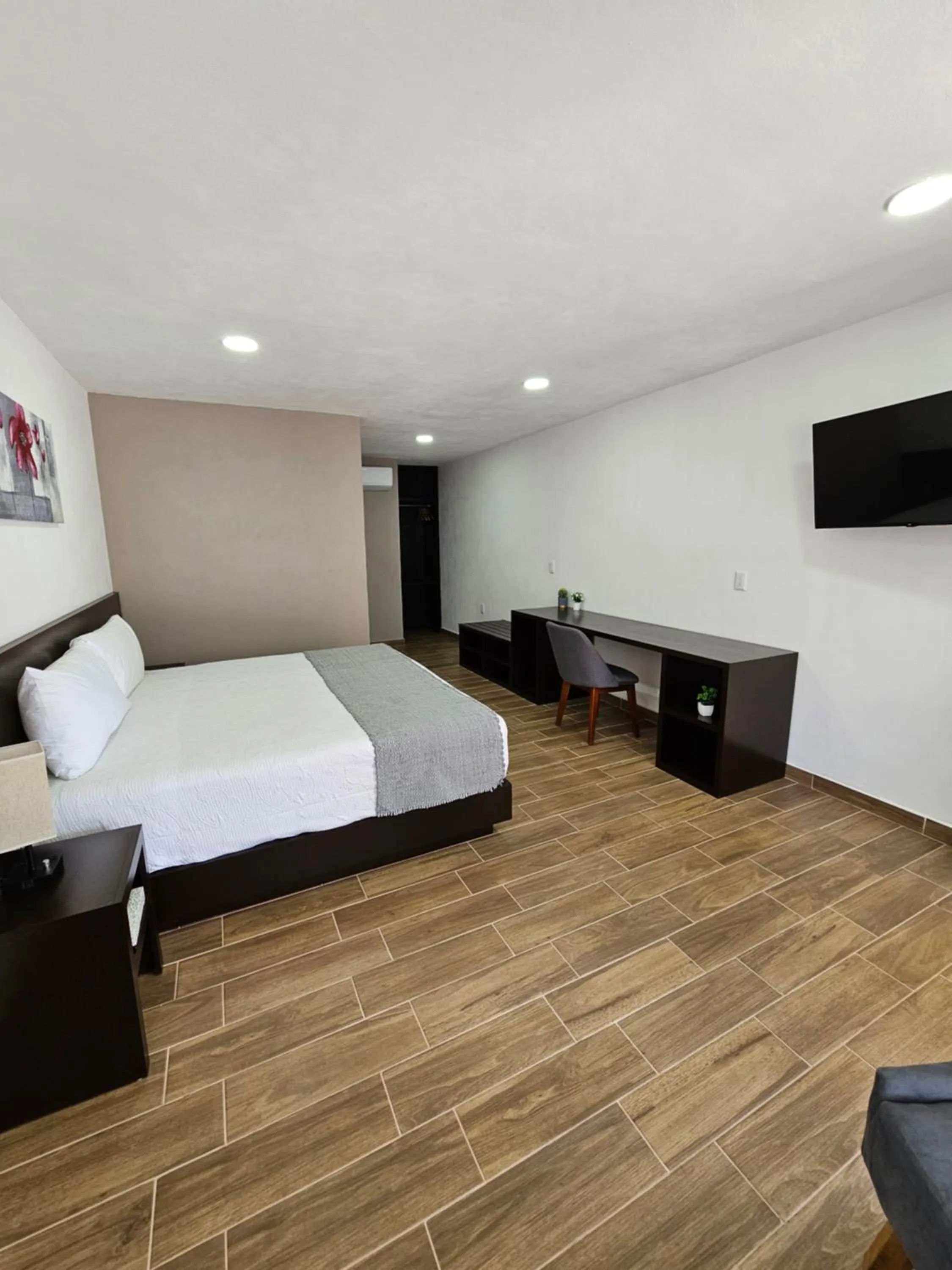 Bed in Hotel Ejecutivo Aeropuerto