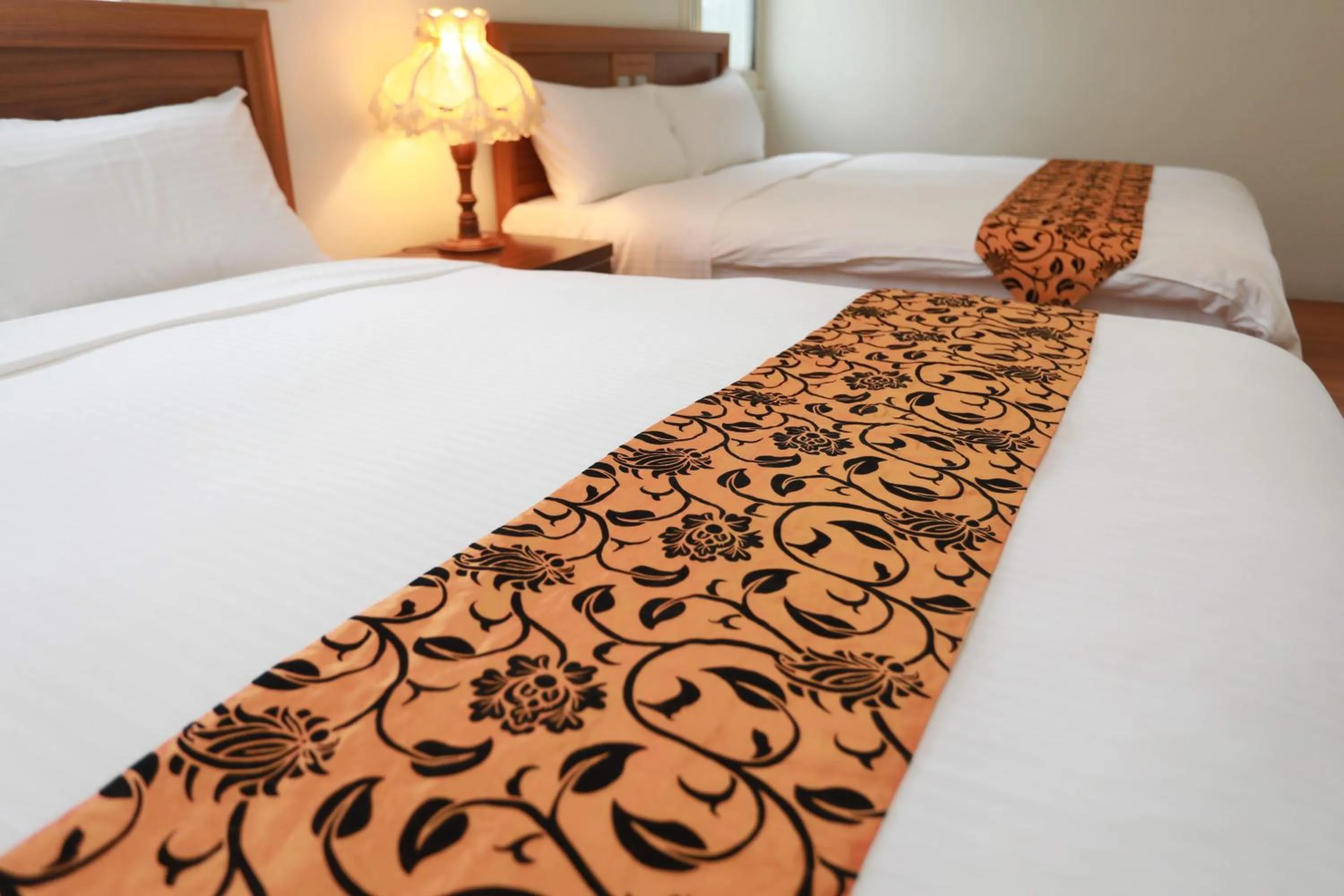 Bed in Hoya Spa Hotel