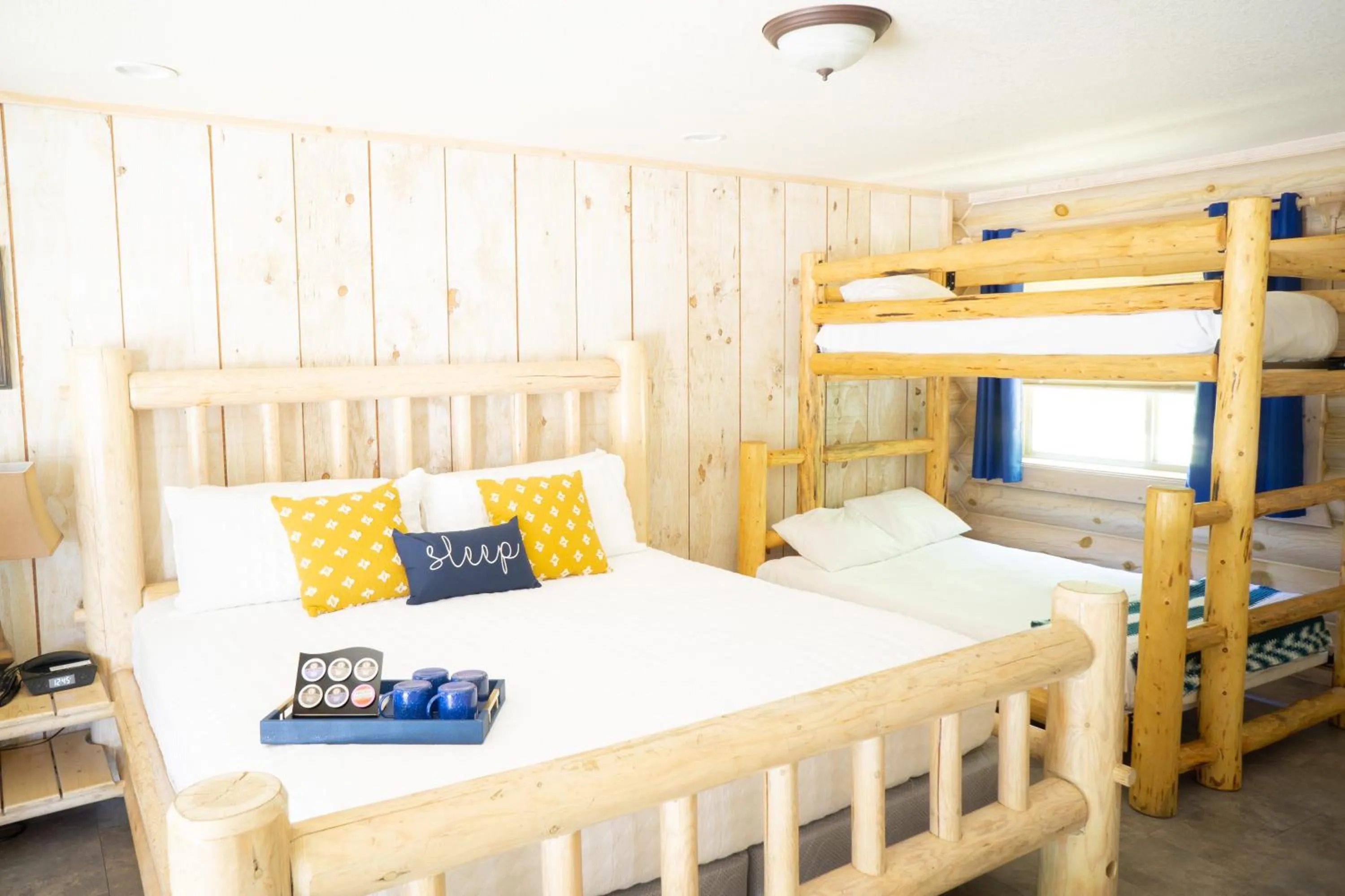 Bed in Log Inn Bonners Ferry