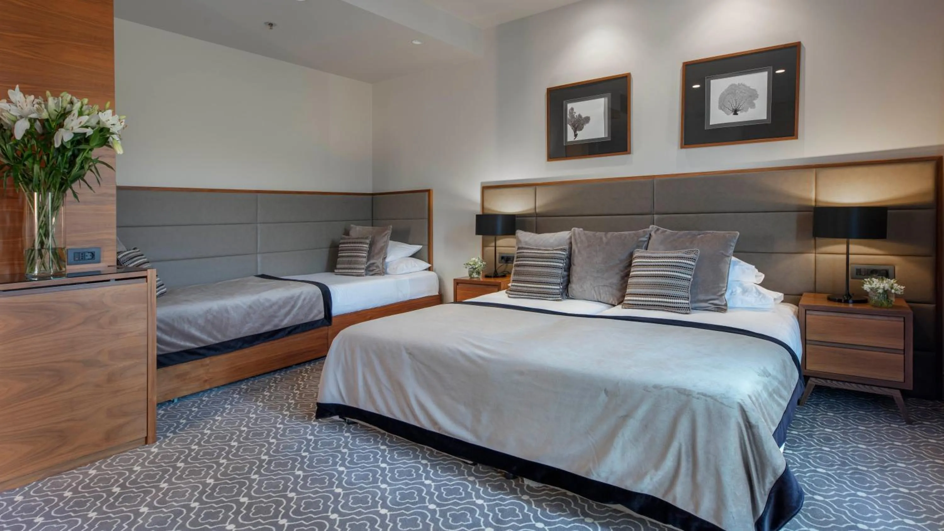 Bed in Royal Ariston Hotel