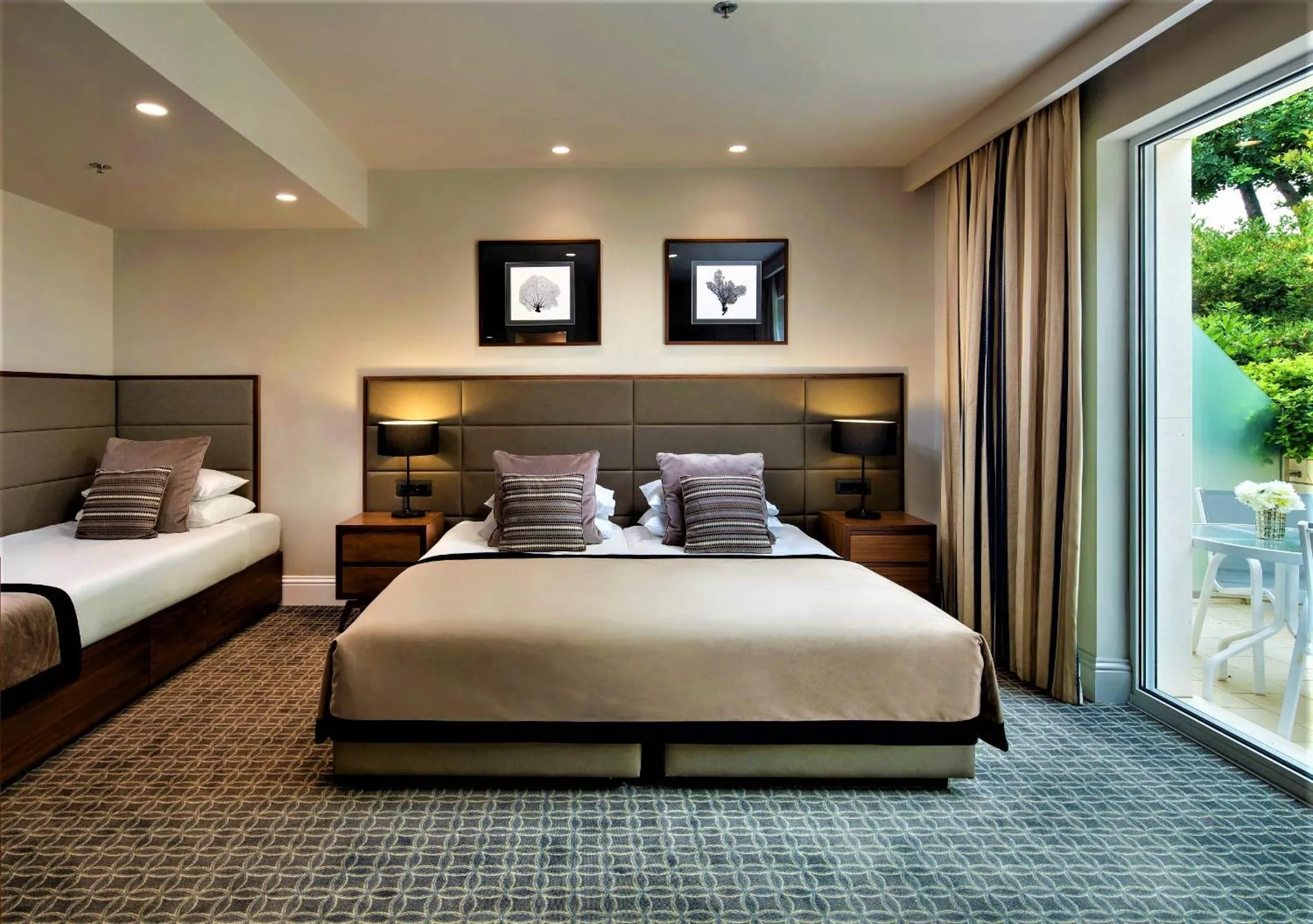 Bed in Royal Ariston Hotel