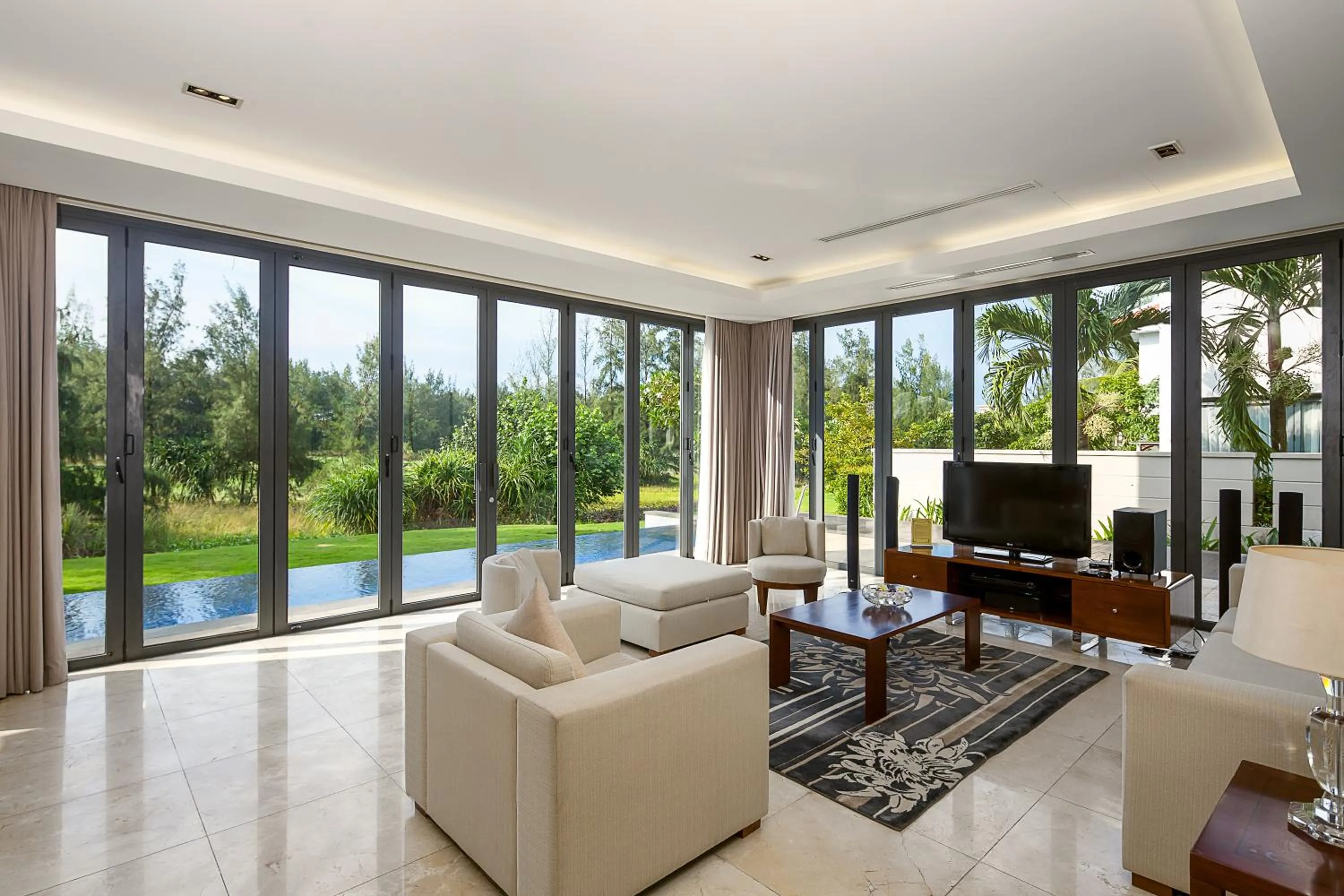 Communal lounge/ TV room in The Ocean Villas Danang