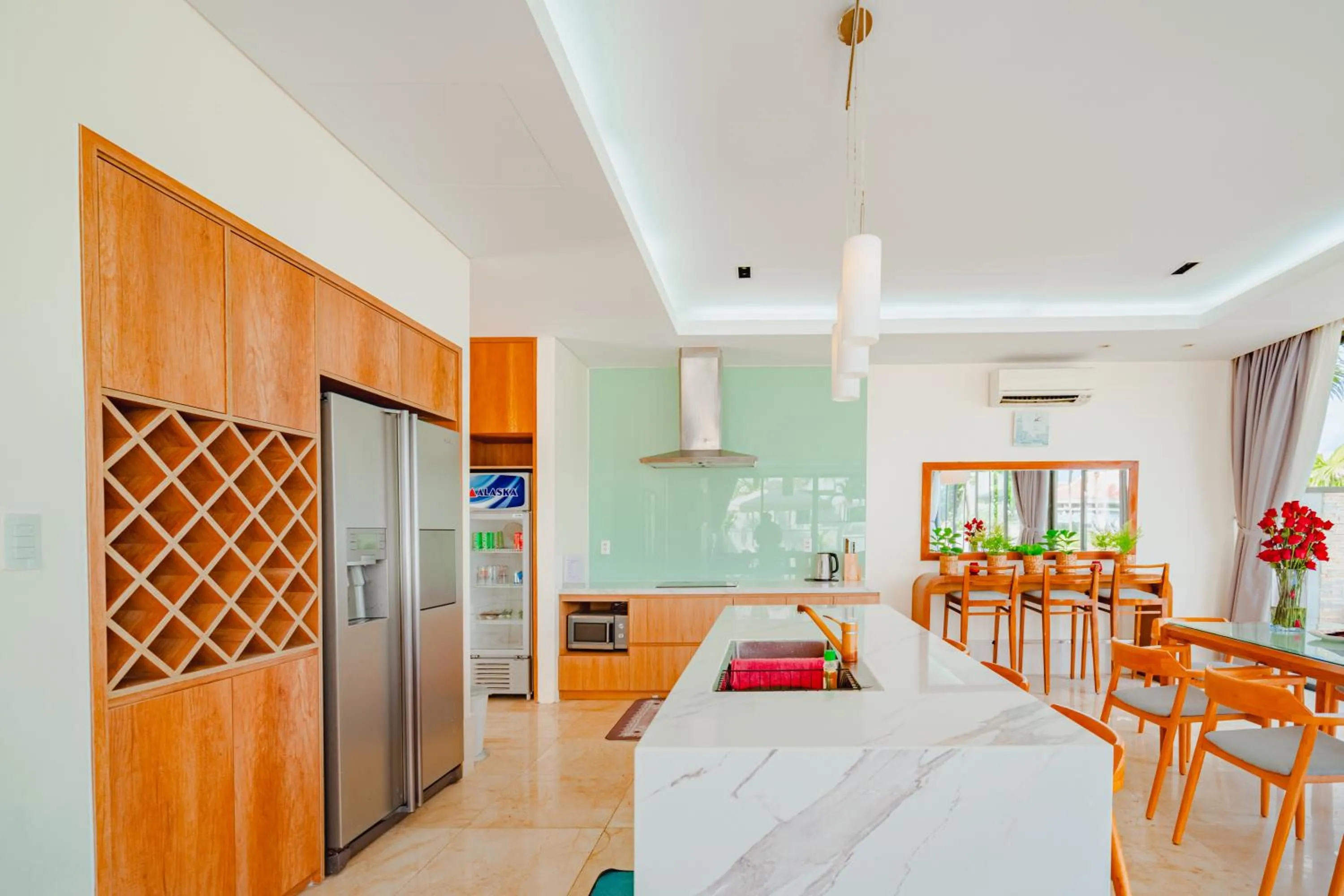 Kitchen or kitchenette, Bed in The Ocean Villas Danang