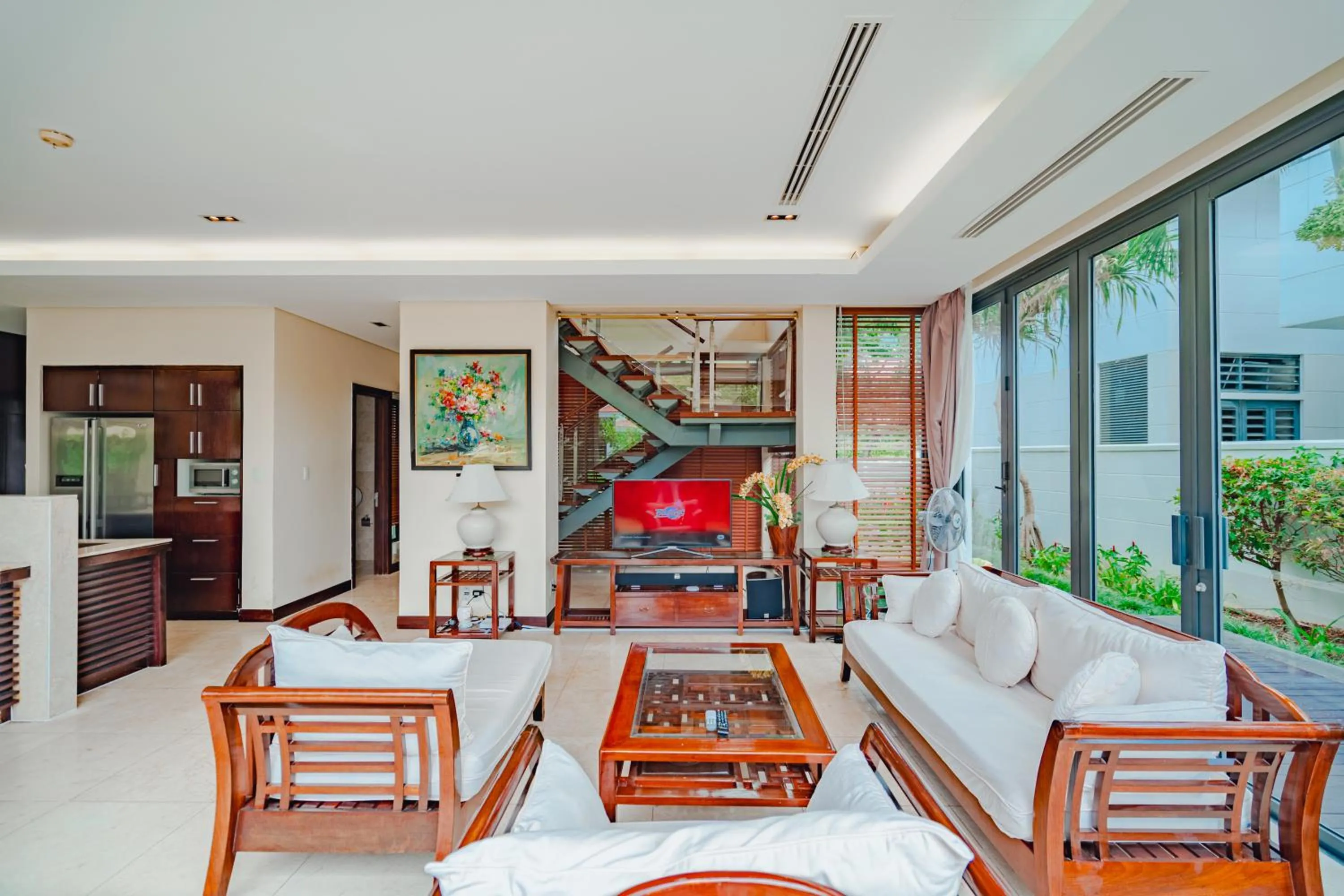Communal lounge/ TV room in The Ocean Villas Danang