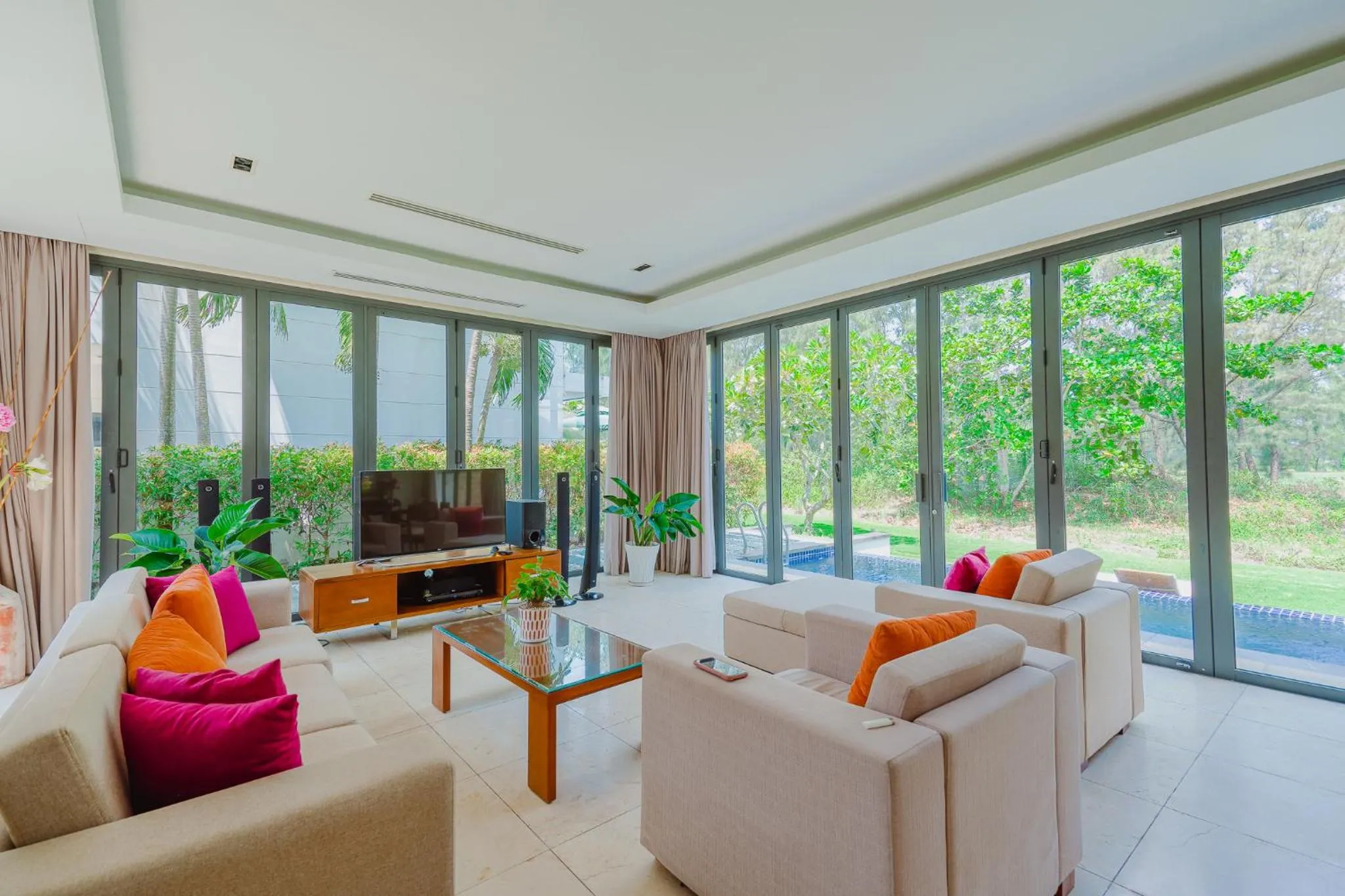 Communal lounge/ TV room in The Ocean Villas Danang