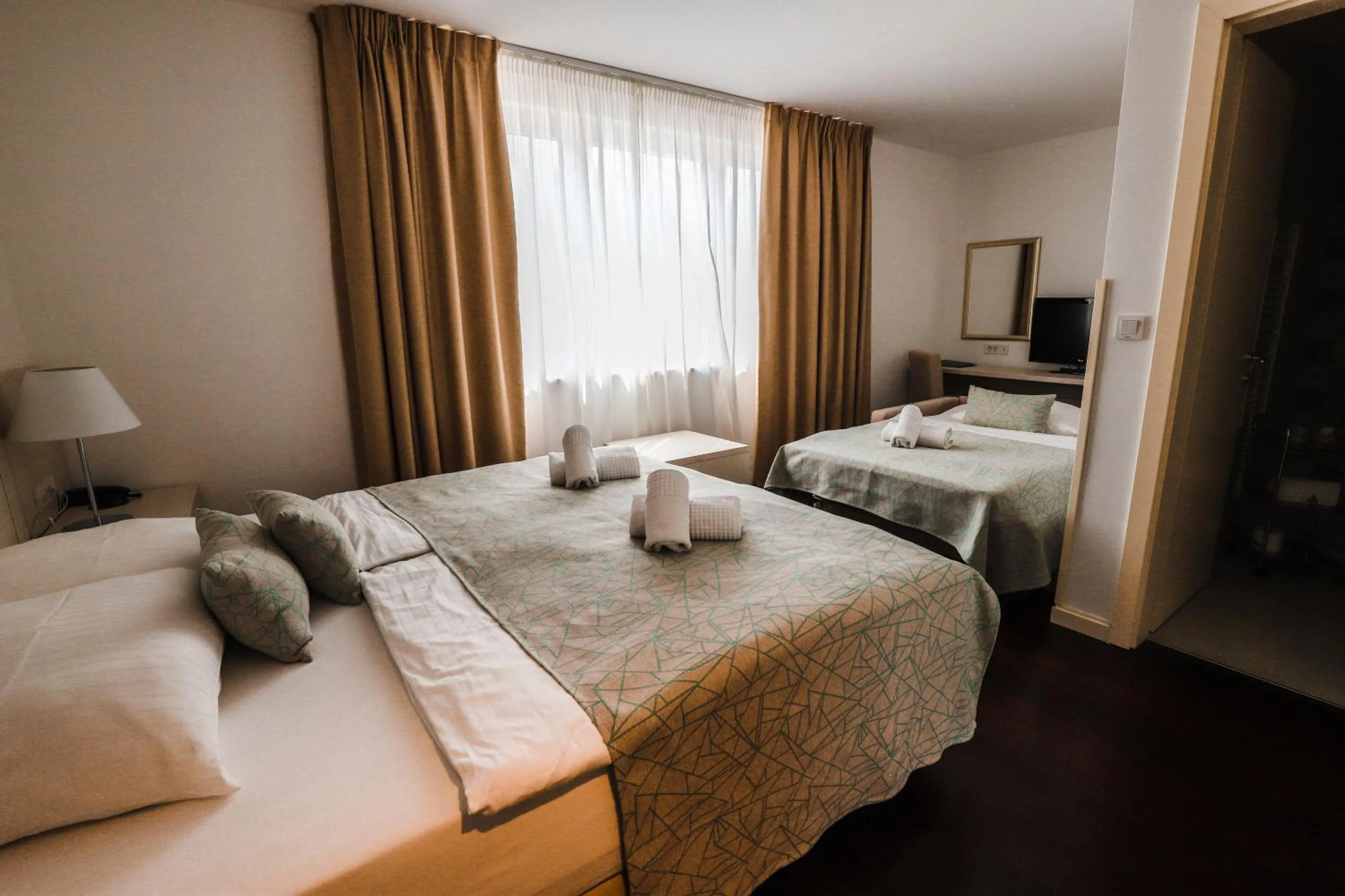 Bed in Hotel Borovnik