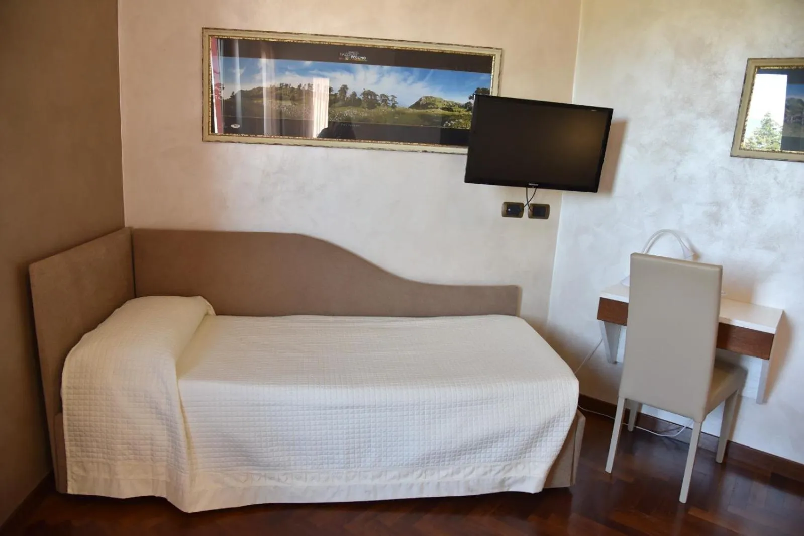 Bed in Hotel Sirio