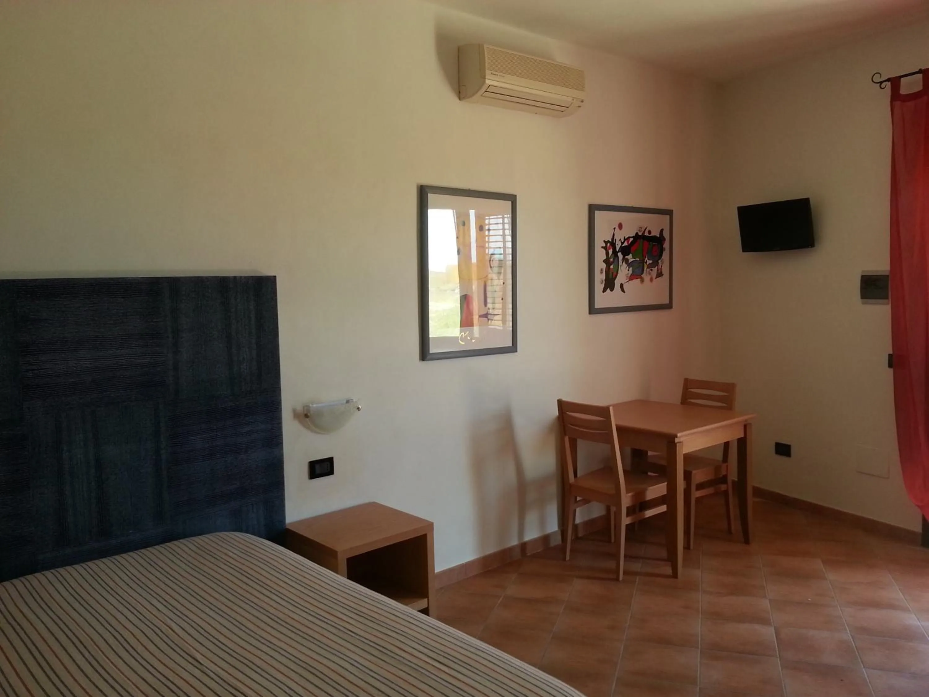 Dining area, Bed in La Casetta di Sara